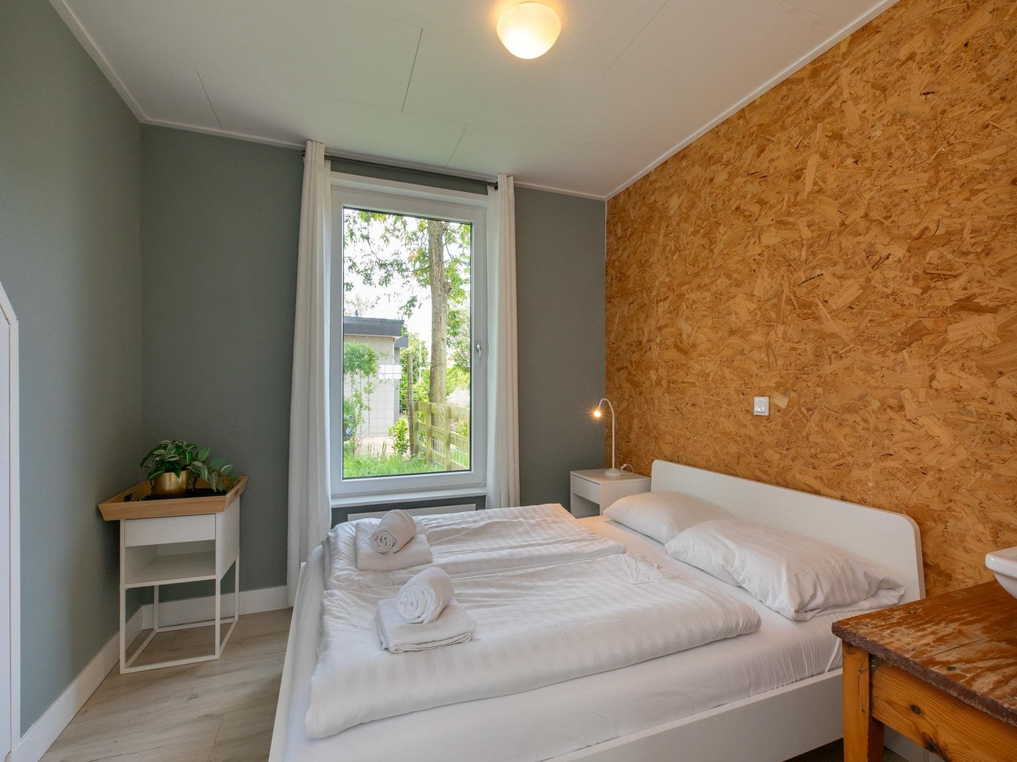 Een slaapkamer van Vakantiewoning - Horizon 14  Renesse in Renesse
