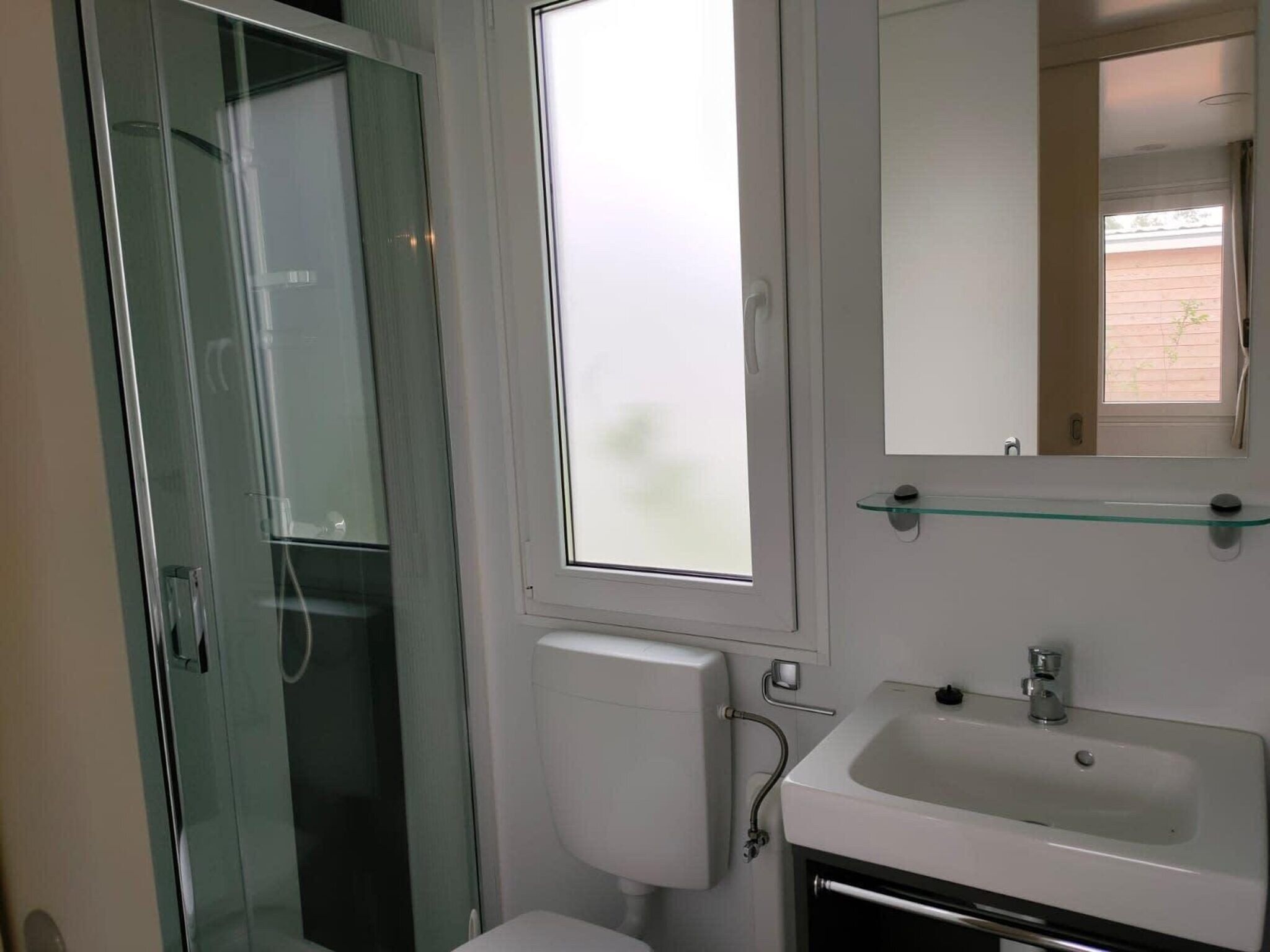De badkamer van Tiny Cottage 22 in Kaatsheuvel