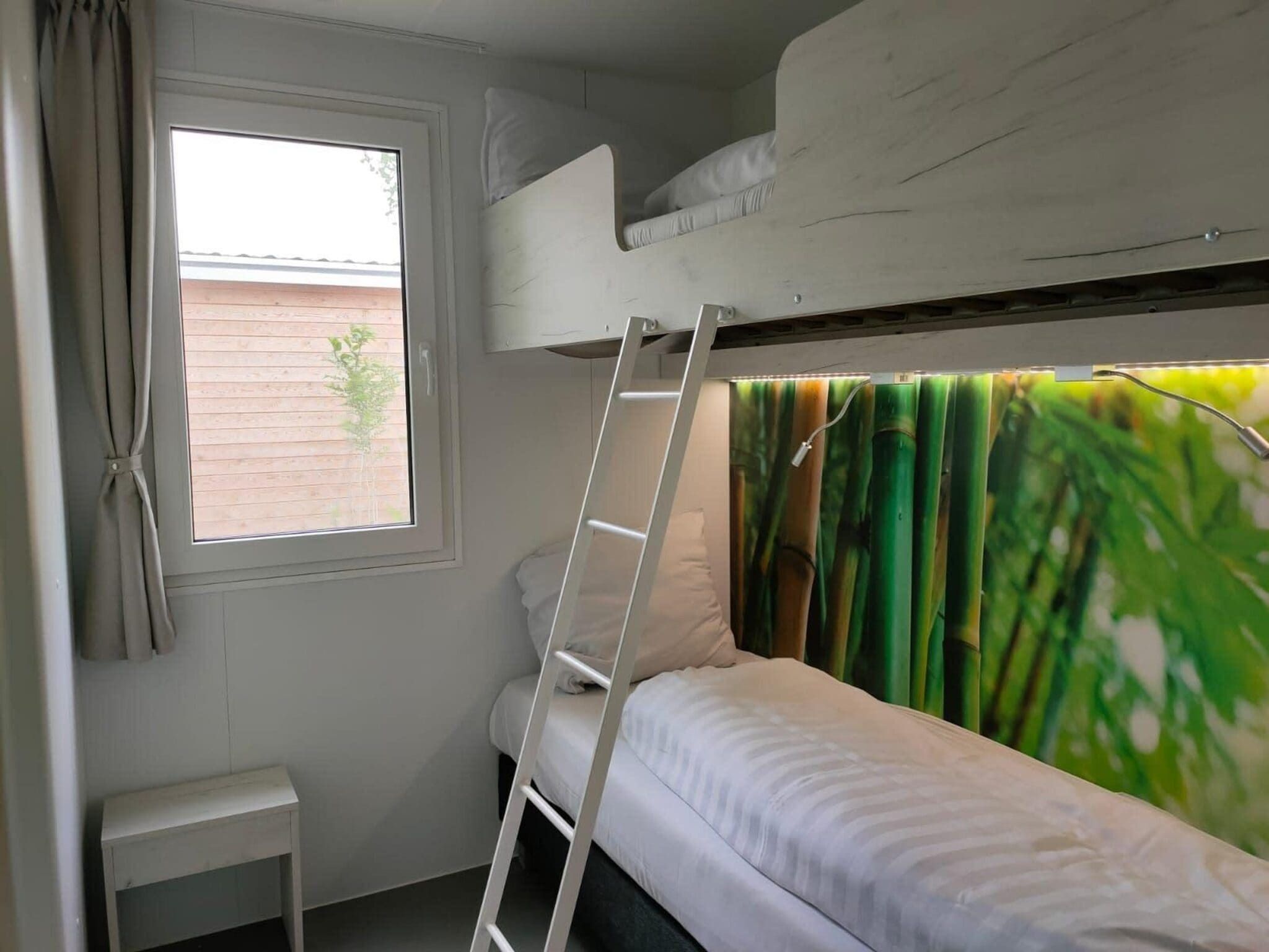 Een slaapkamer van Tiny Cottage 22 in Kaatsheuvel