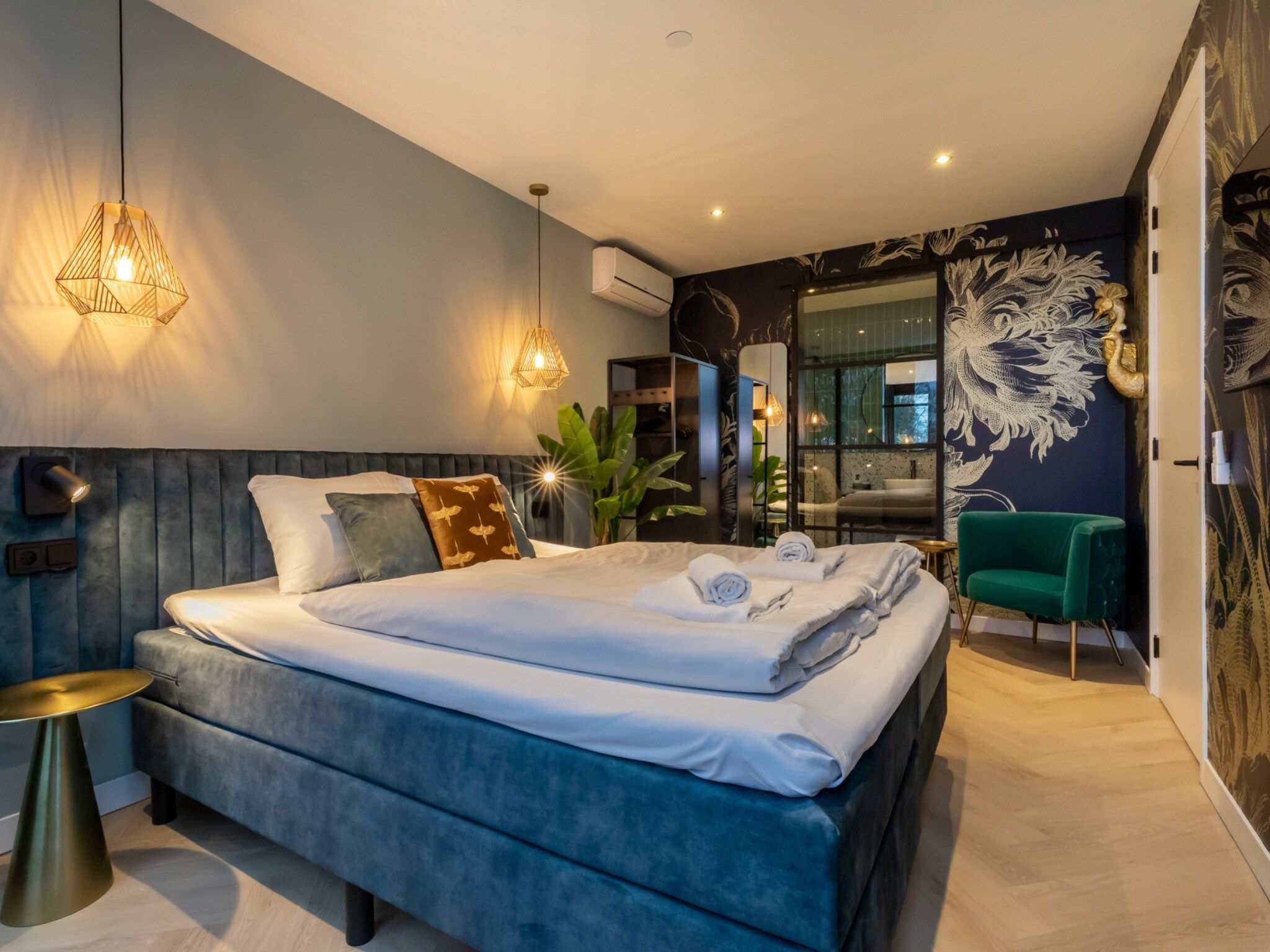 Een slaapkamer van Vakantiewoning ZEEBRIES in Koudekerke