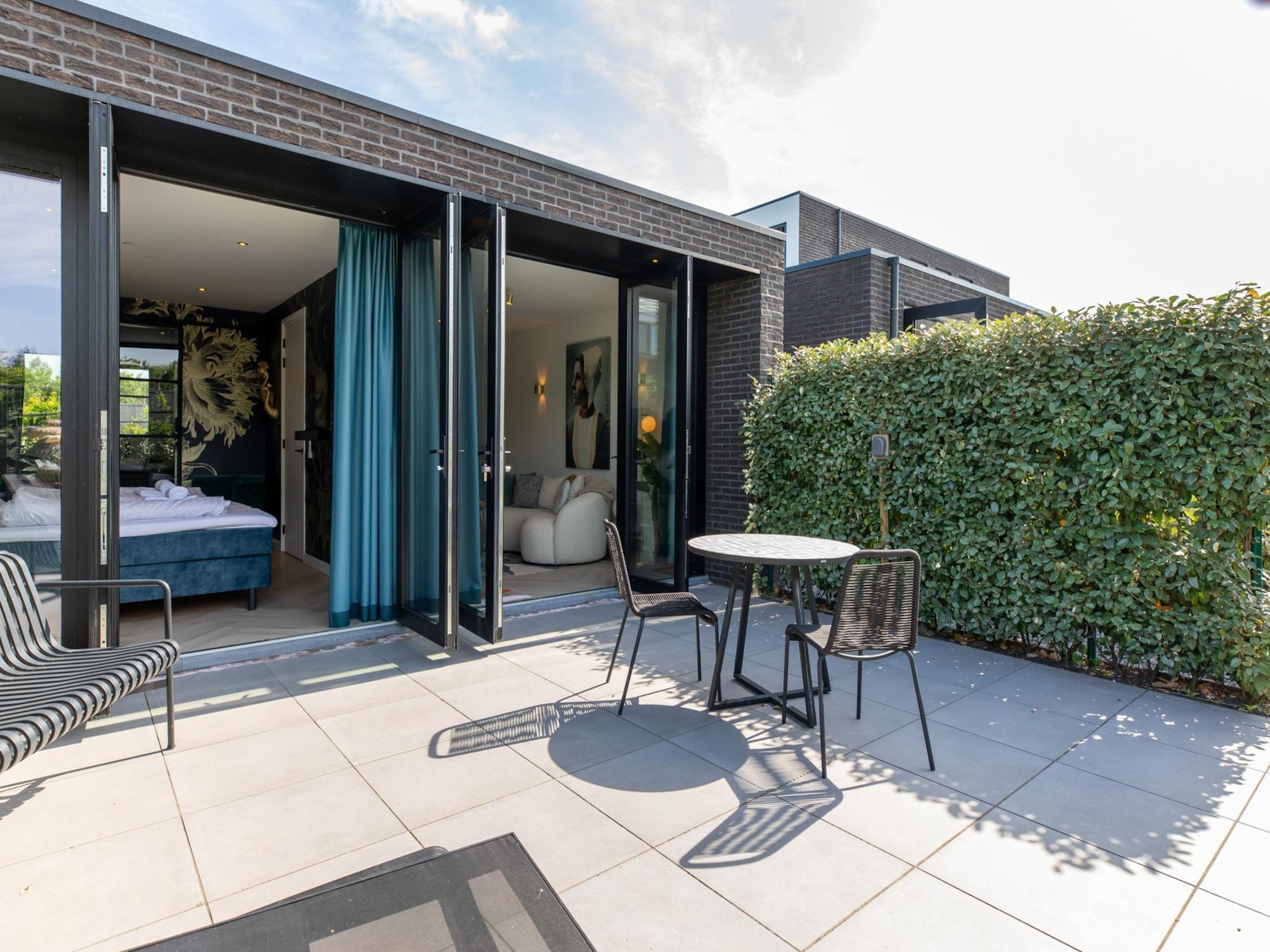 De tuin van Vakantiewoning ZEEBRIES in Koudekerke