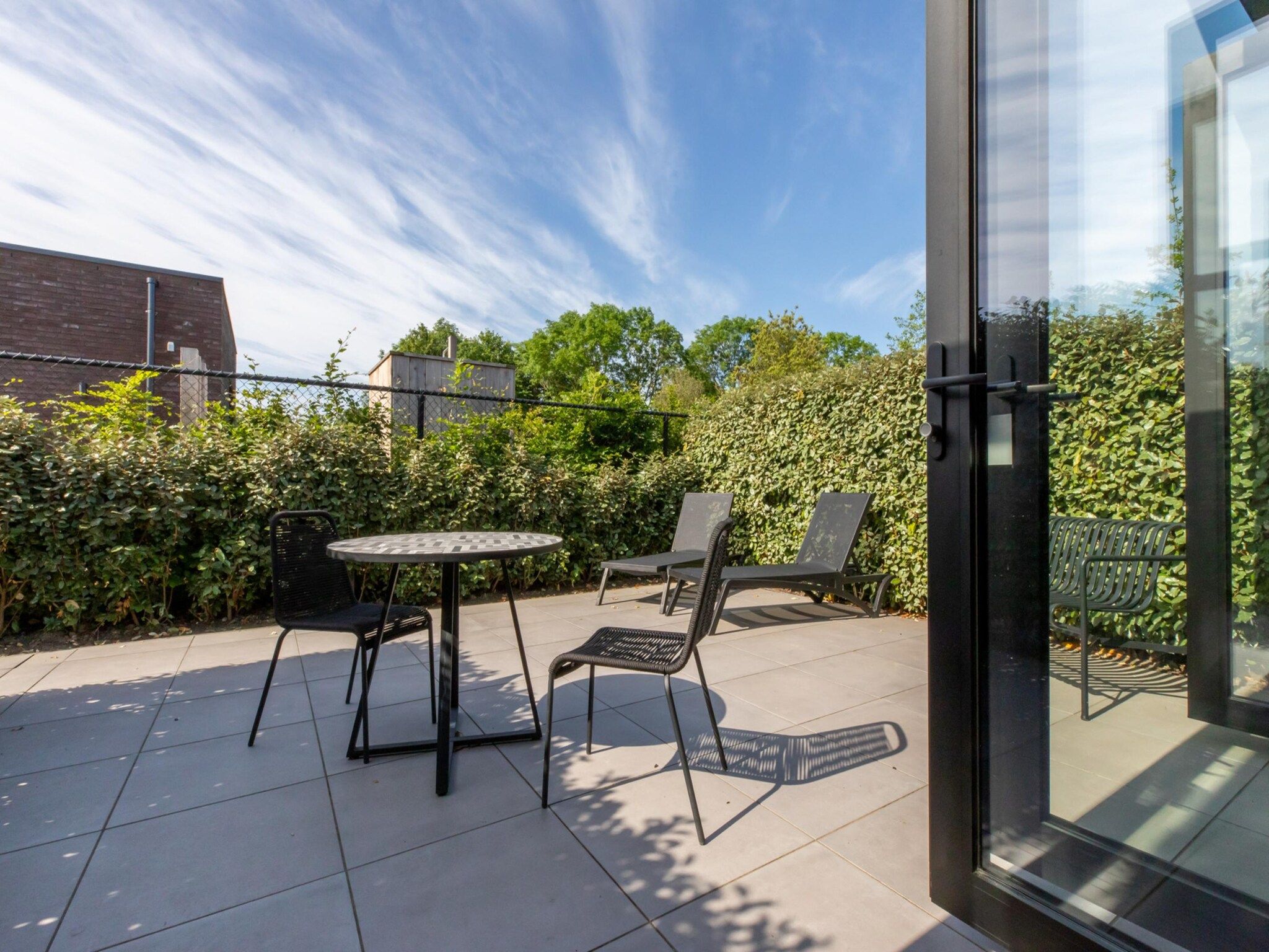 De tuin van Vakantiewoning ZEEBRIES in Koudekerke