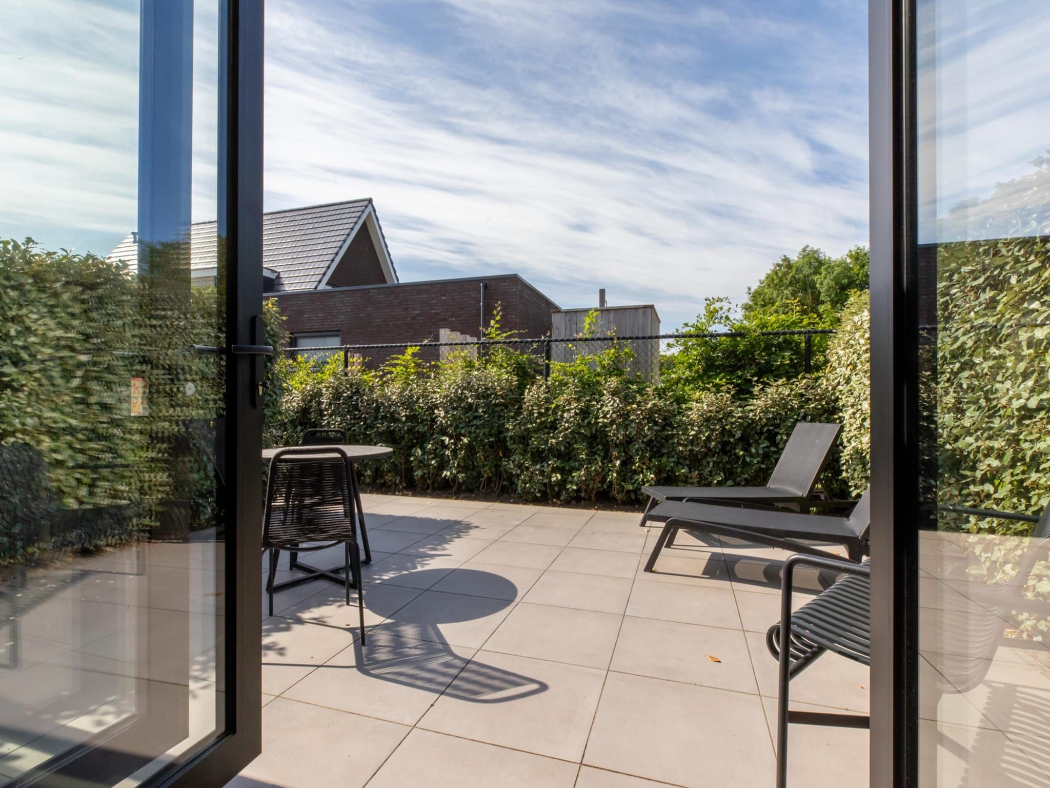 De tuin van Vakantiewoning ZEEBRIES in Koudekerke