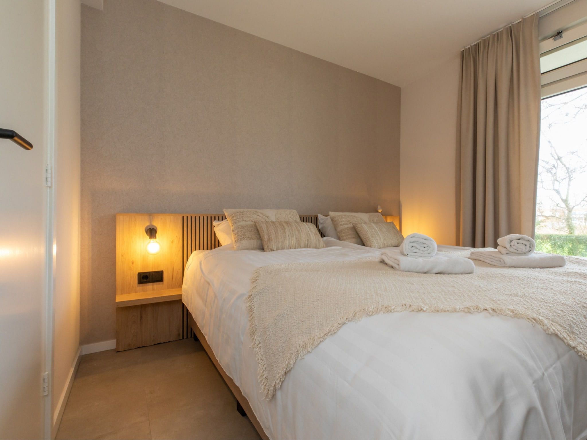 Een slaapkamer van Zoutelande 'Kurhaus appartement nr 1 in Zoutelande