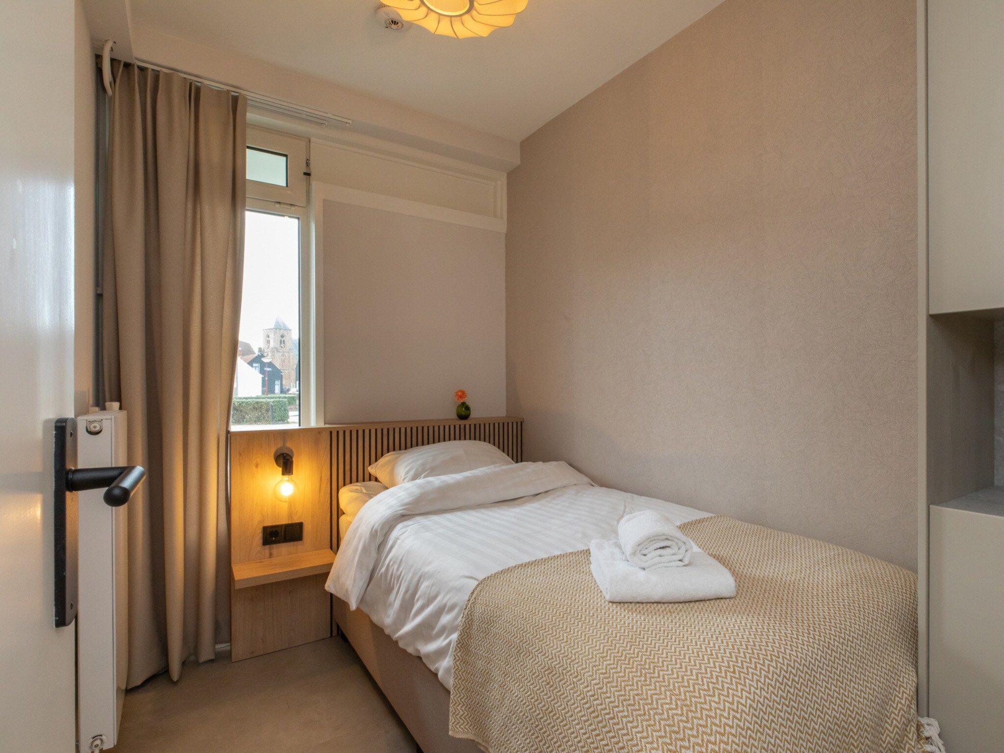 Een slaapkamer van Zoutelande 'Kurhaus appartement nr 1 in Zoutelande