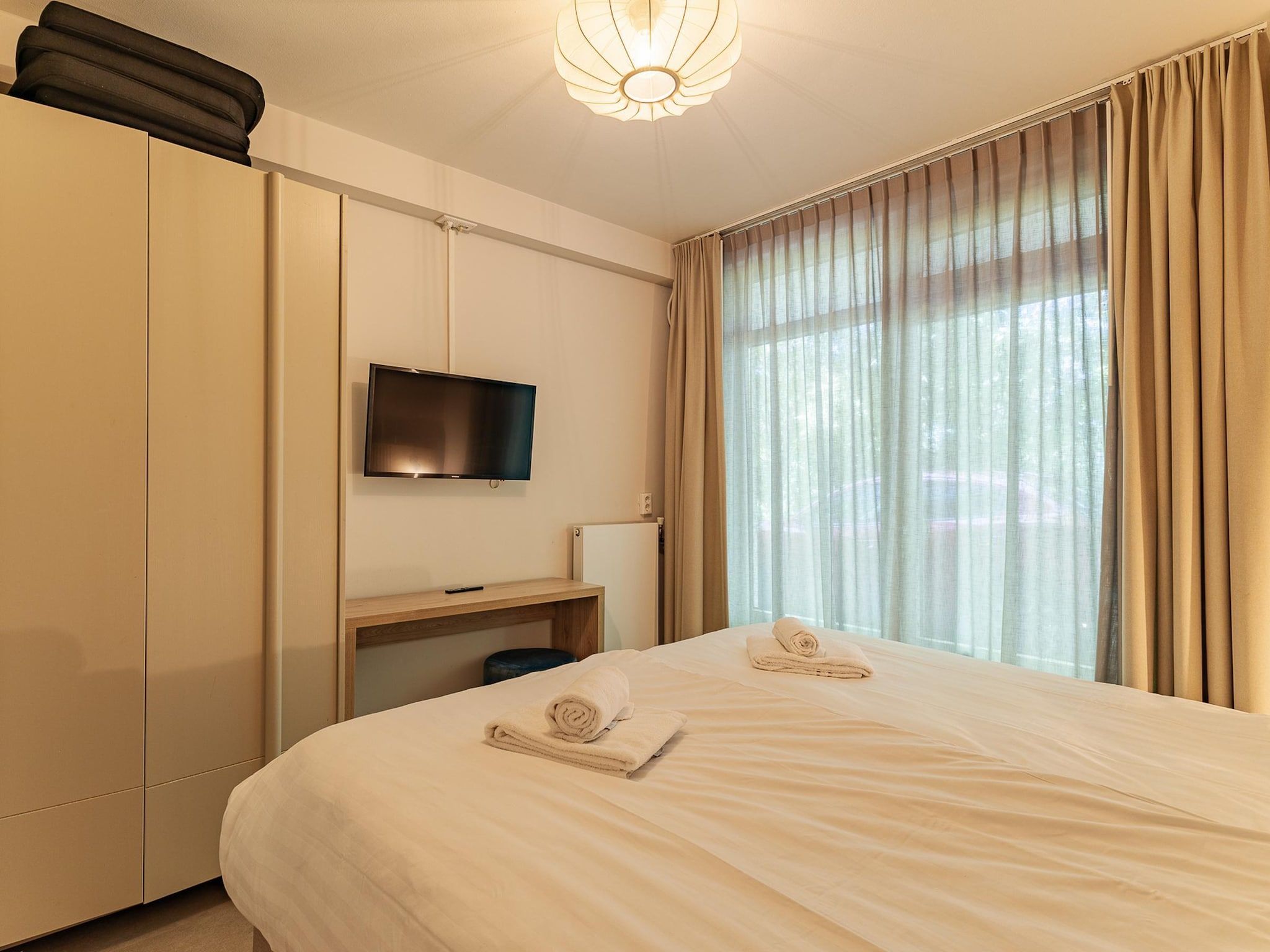 Een slaapkamer van Nieuwstraat 1  Zoutelande 'Kurhaus - 2 in Zoutelande