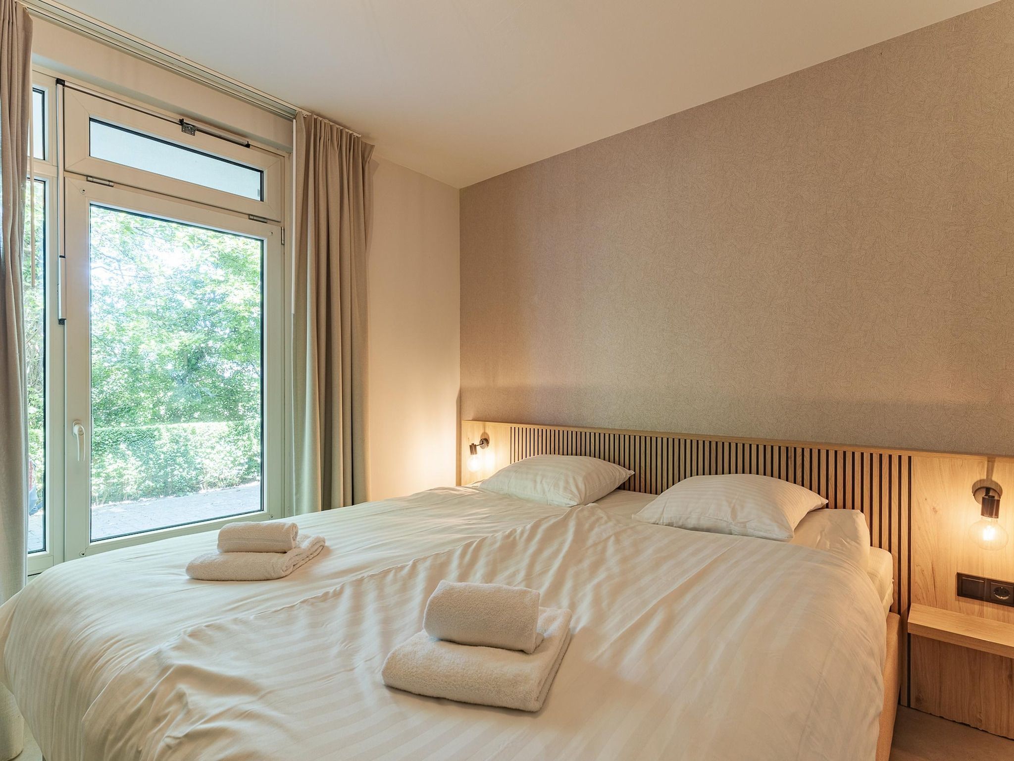 Een slaapkamer van Nieuwstraat 1  Zoutelande 'Kurhaus - 2 in Zoutelande