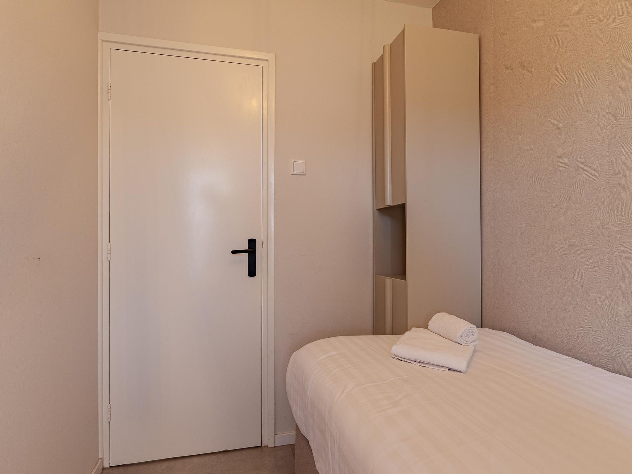 Een slaapkamer van Nieuwstraat 1  Zoutelande 'Kurhaus - 2 in Zoutelande