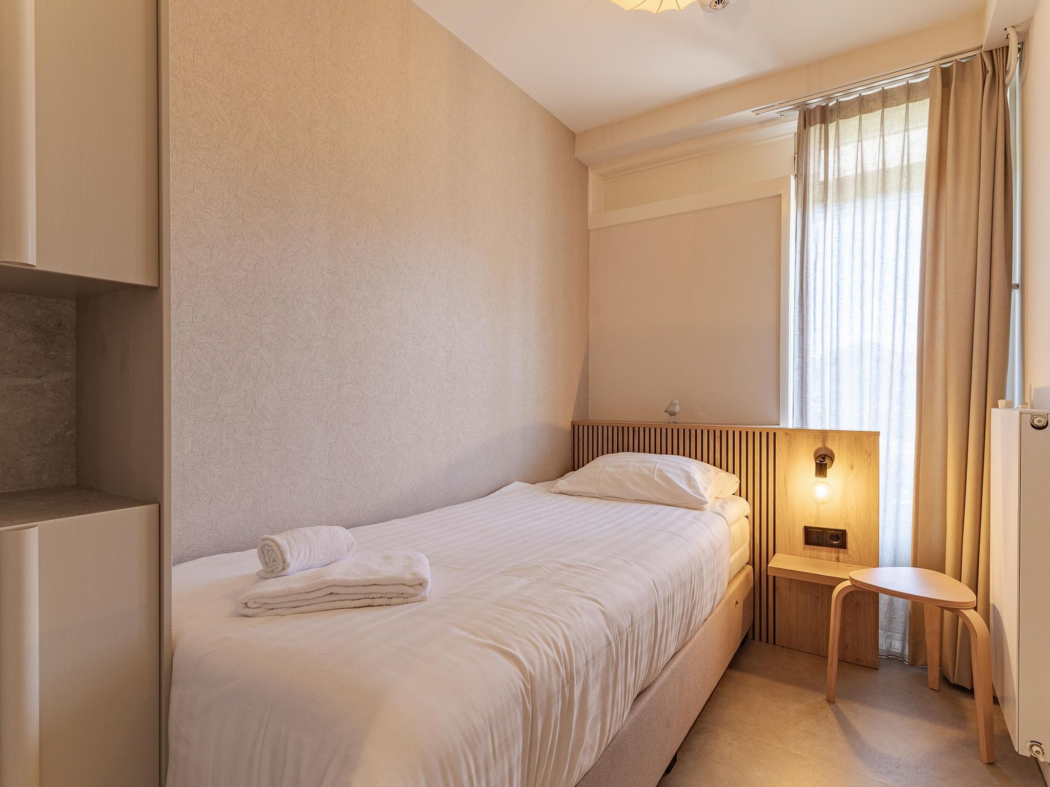 Een slaapkamer van Nieuwstraat 1  Zoutelande 'Kurhaus - 2 in Zoutelande
