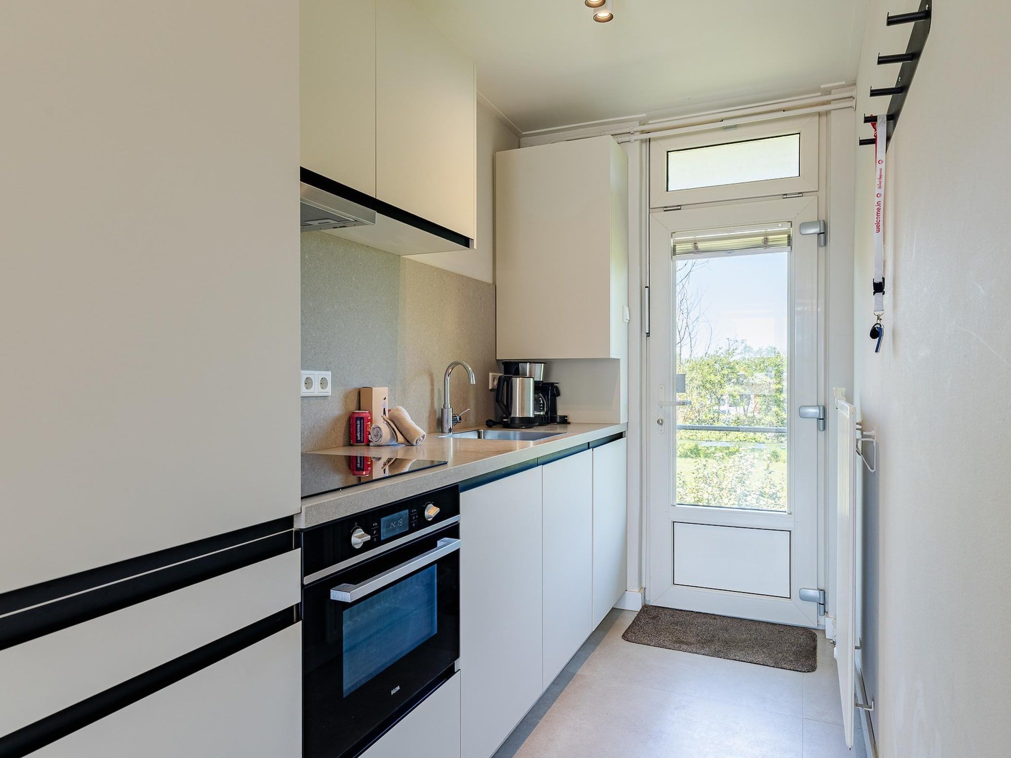 De keuken van Nieuwstraat 1  Zoutelande 'Kurhaus - 14 met sauna in Zoutelande