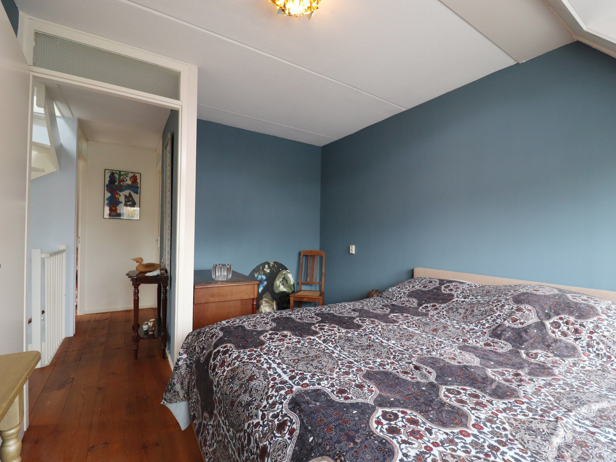 Een slaapkamer van Vakantiehuis in zonnig Grou in Gou