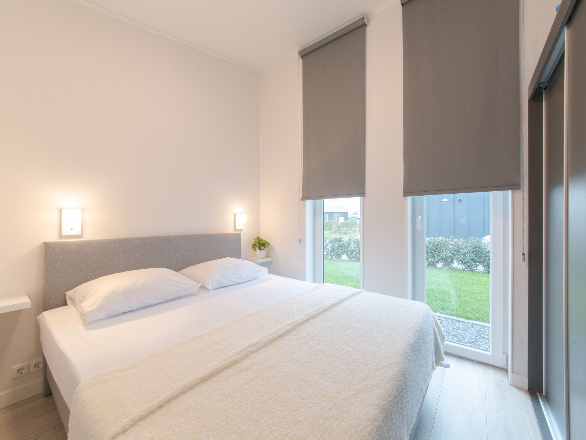 Een slaapkamer van Water Resort Oosterschelde 45 in Wemeldinge