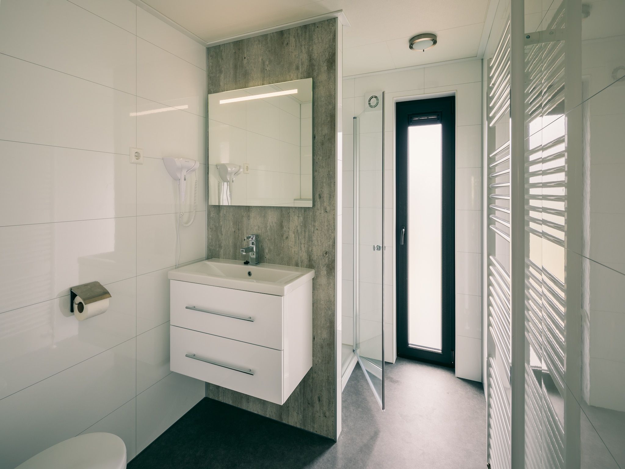 De badkamer van Vakantiepark Zeedijk 5 in Herkingen