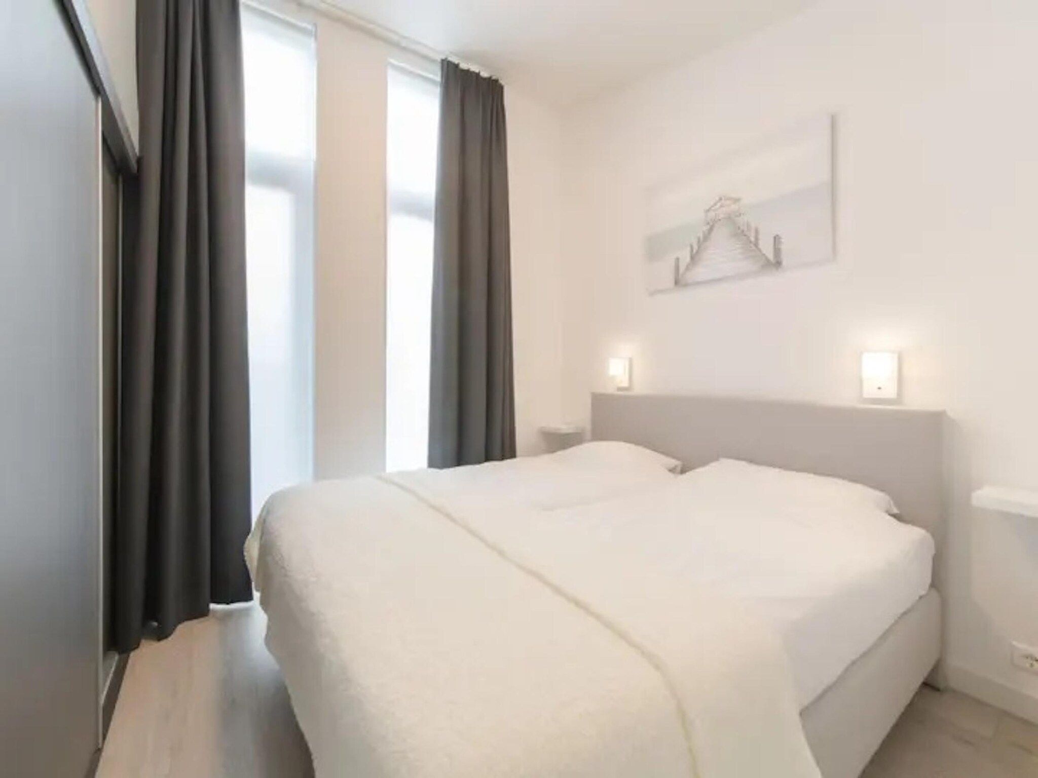 Een slaapkamer van Water Resort Oosterschelde 18A in Wemeldinge