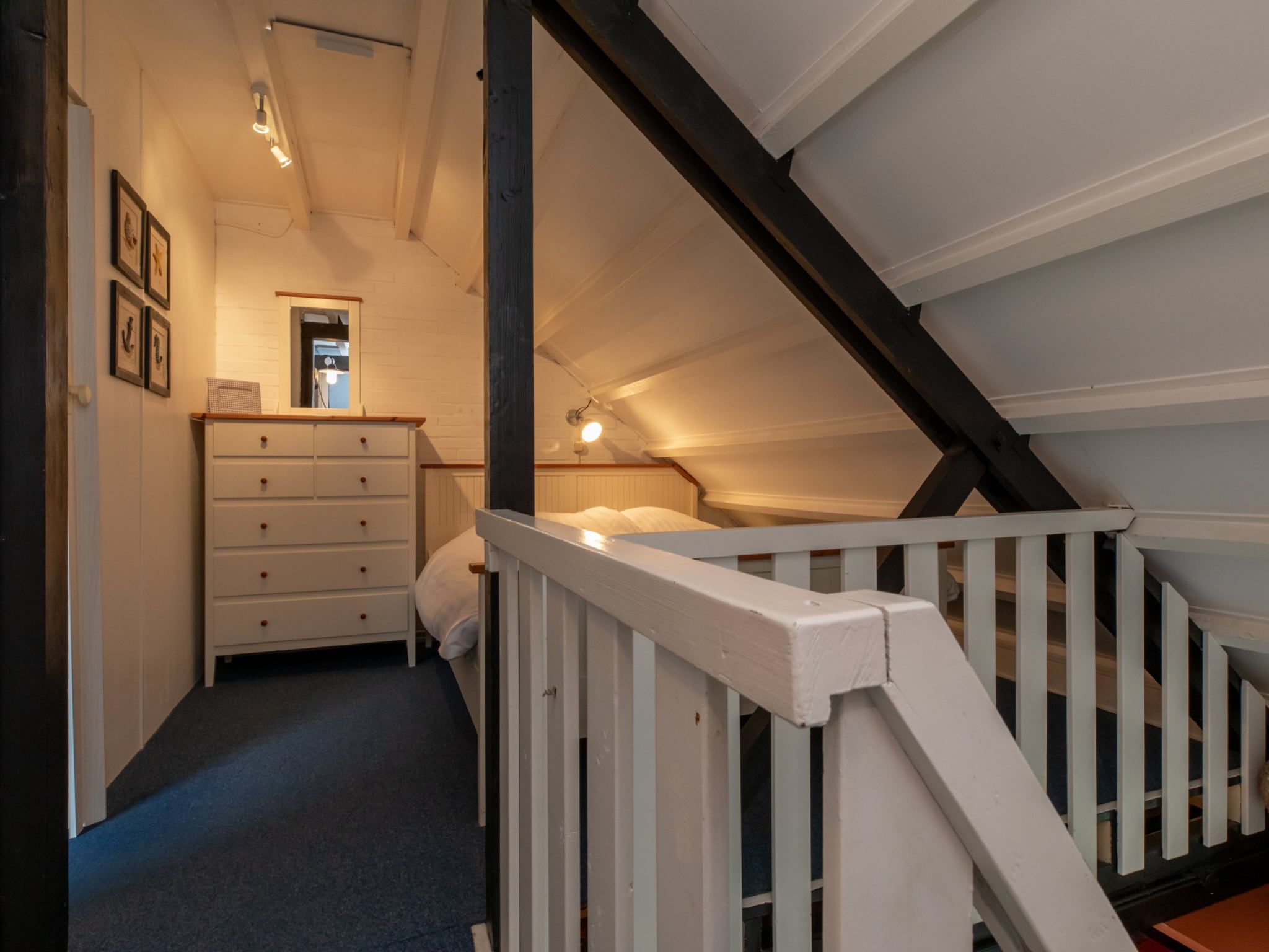 Een slaapkamer van De Haaijmanweg 5  Burgh Haamstede 'Huisje 86' in Burgh-Haamstede