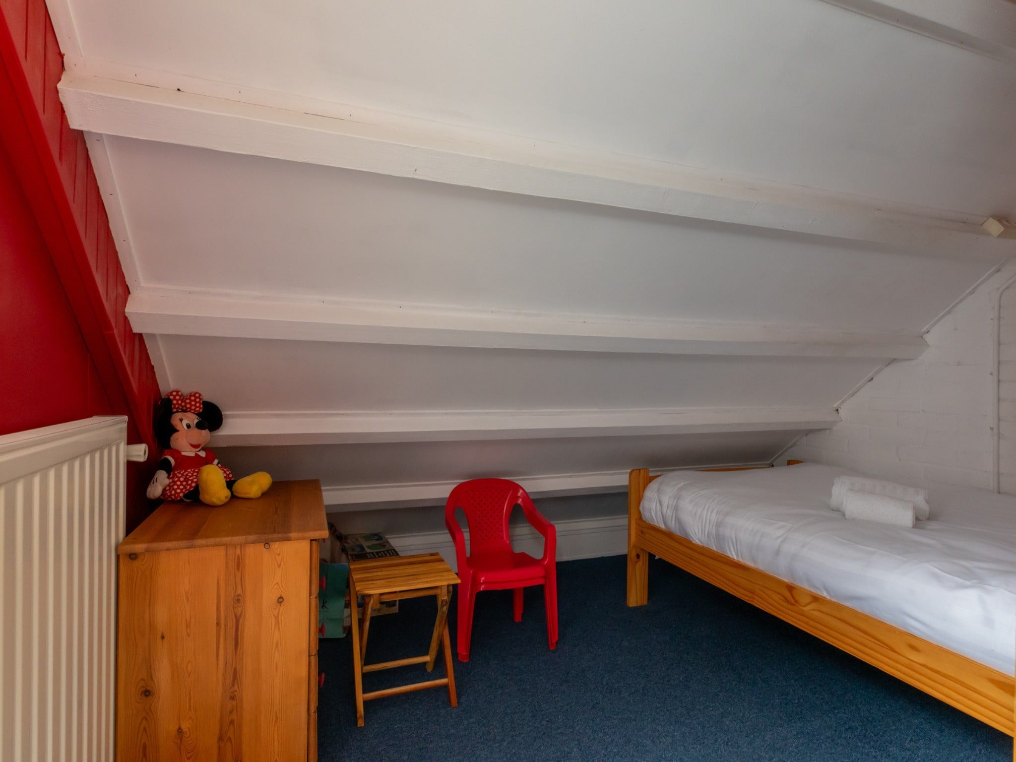 Een slaapkamer van De Haaijmanweg 5  Burgh Haamstede 'Huisje 86' in Burgh-Haamstede