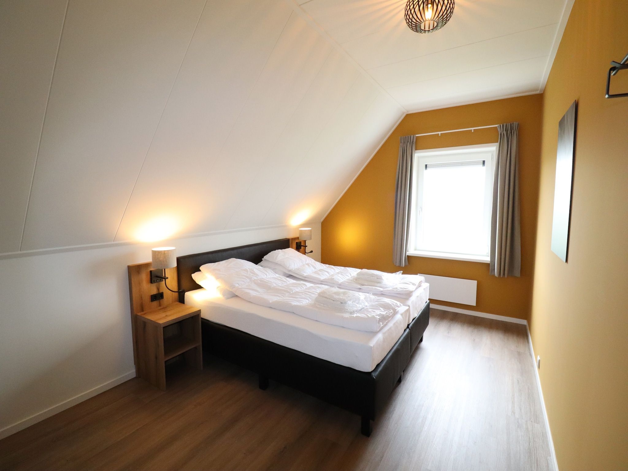 Een slaapkamer van Friese villa in Leons