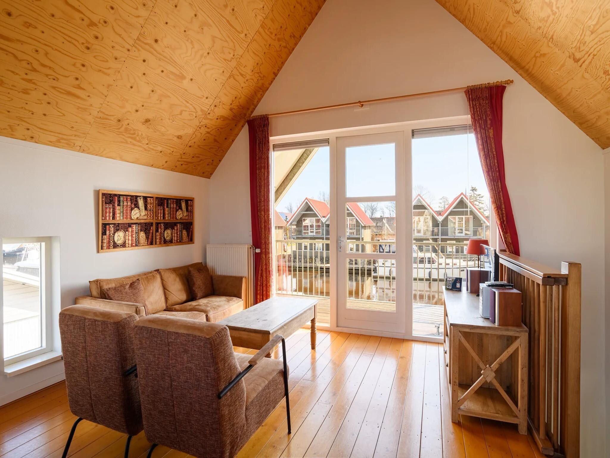 De woonkamer van Havenresort Terherne 3 in Terherne