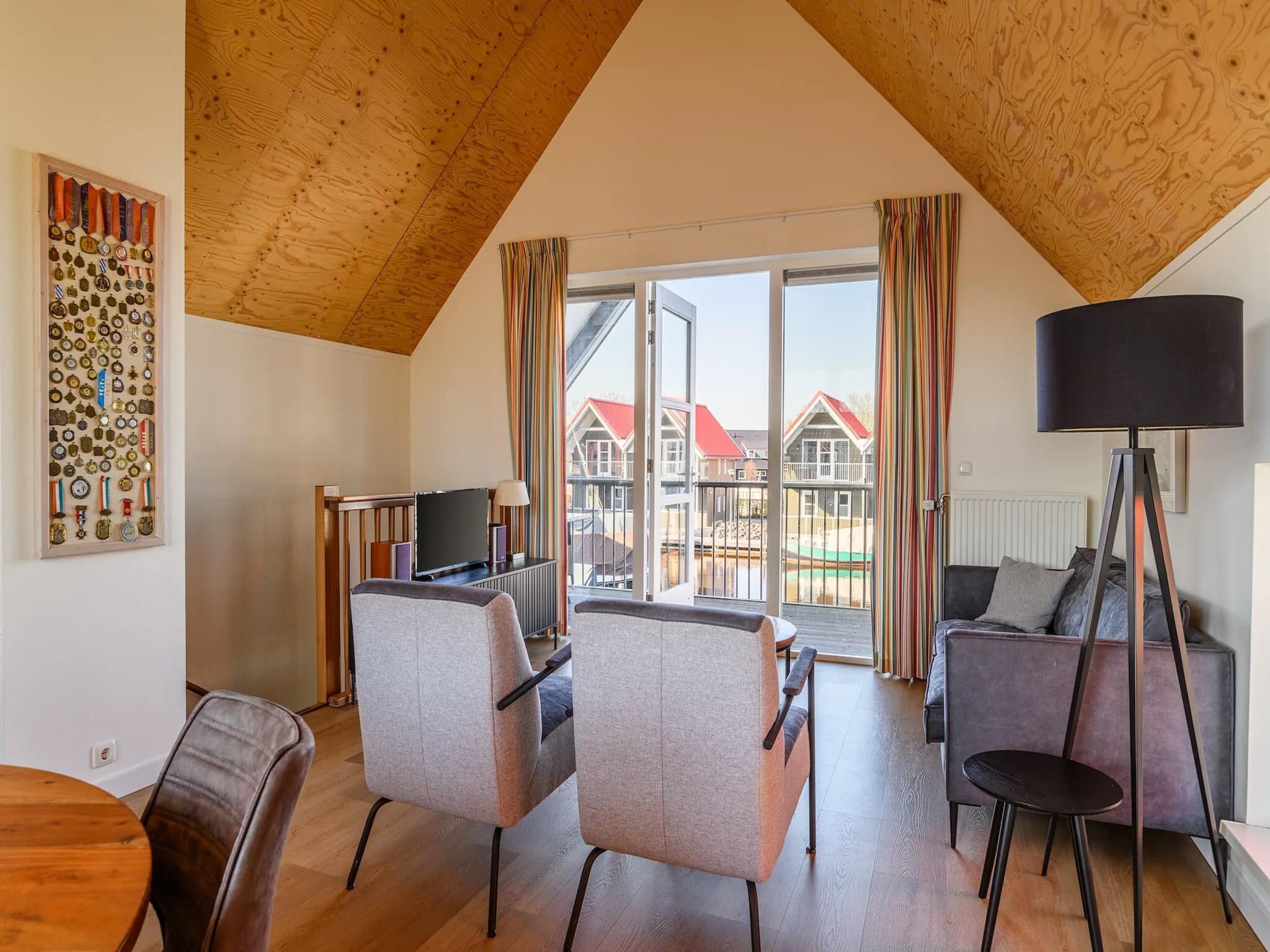 De woonkamer van Havenresort Terherne 3 in Terherne