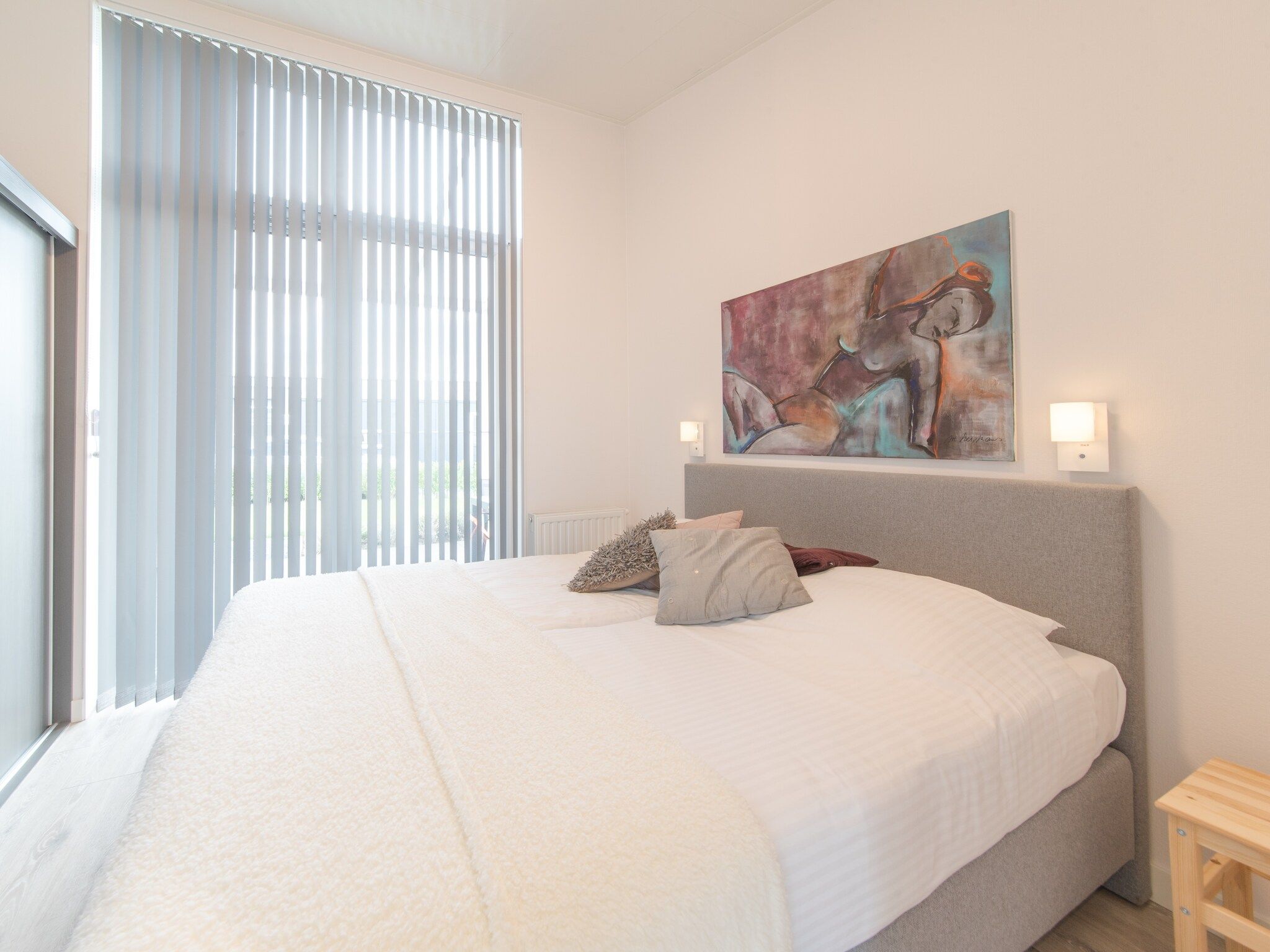 Een slaapkamer van Water Resort Oosterschelde 59 in Wemeldinge