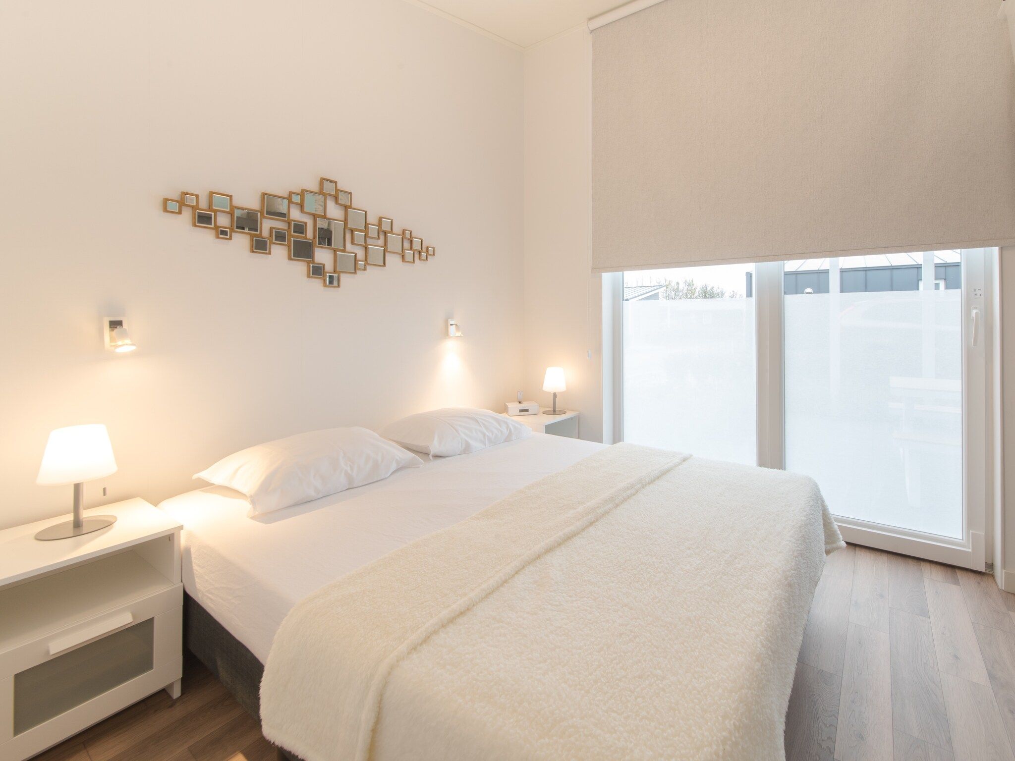 Een slaapkamer van Water Resort Oosterschelde 76 in Wemeldinge