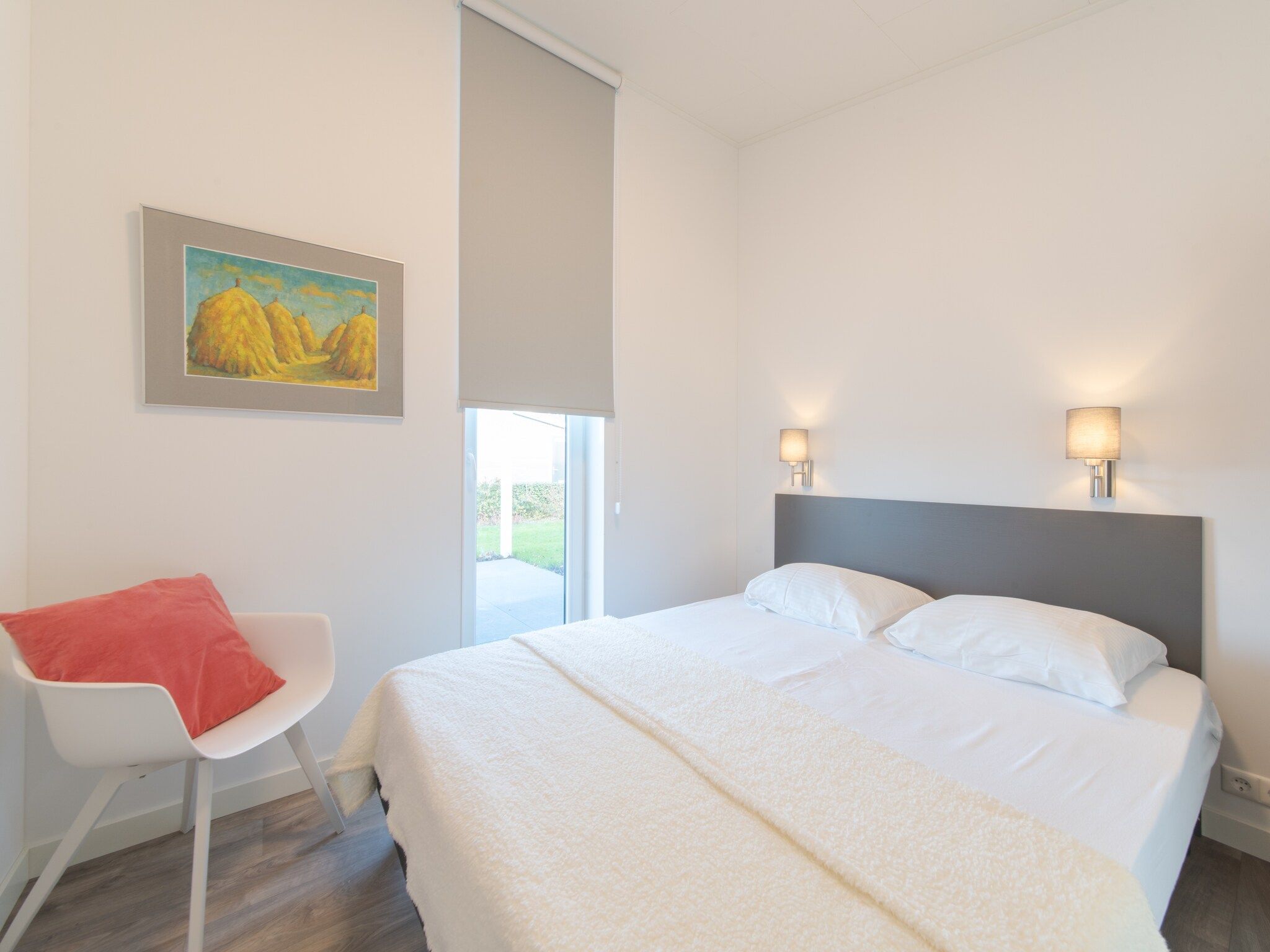 Een slaapkamer van Water Resort Oosterschelde 101 in Wemeldinge
