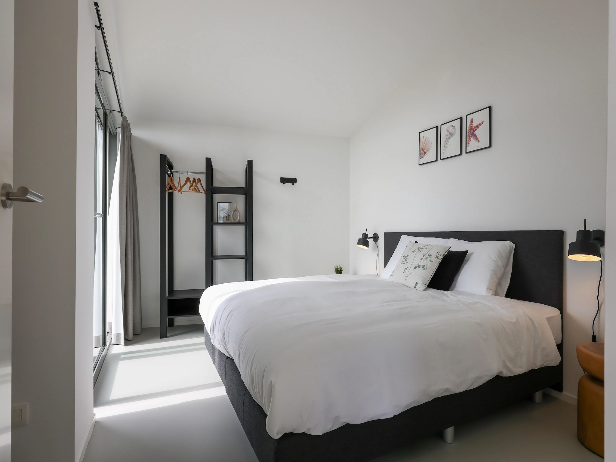 Een slaapkamer van Heerlijkheid Vlietenburg 12 in Wissenkerke