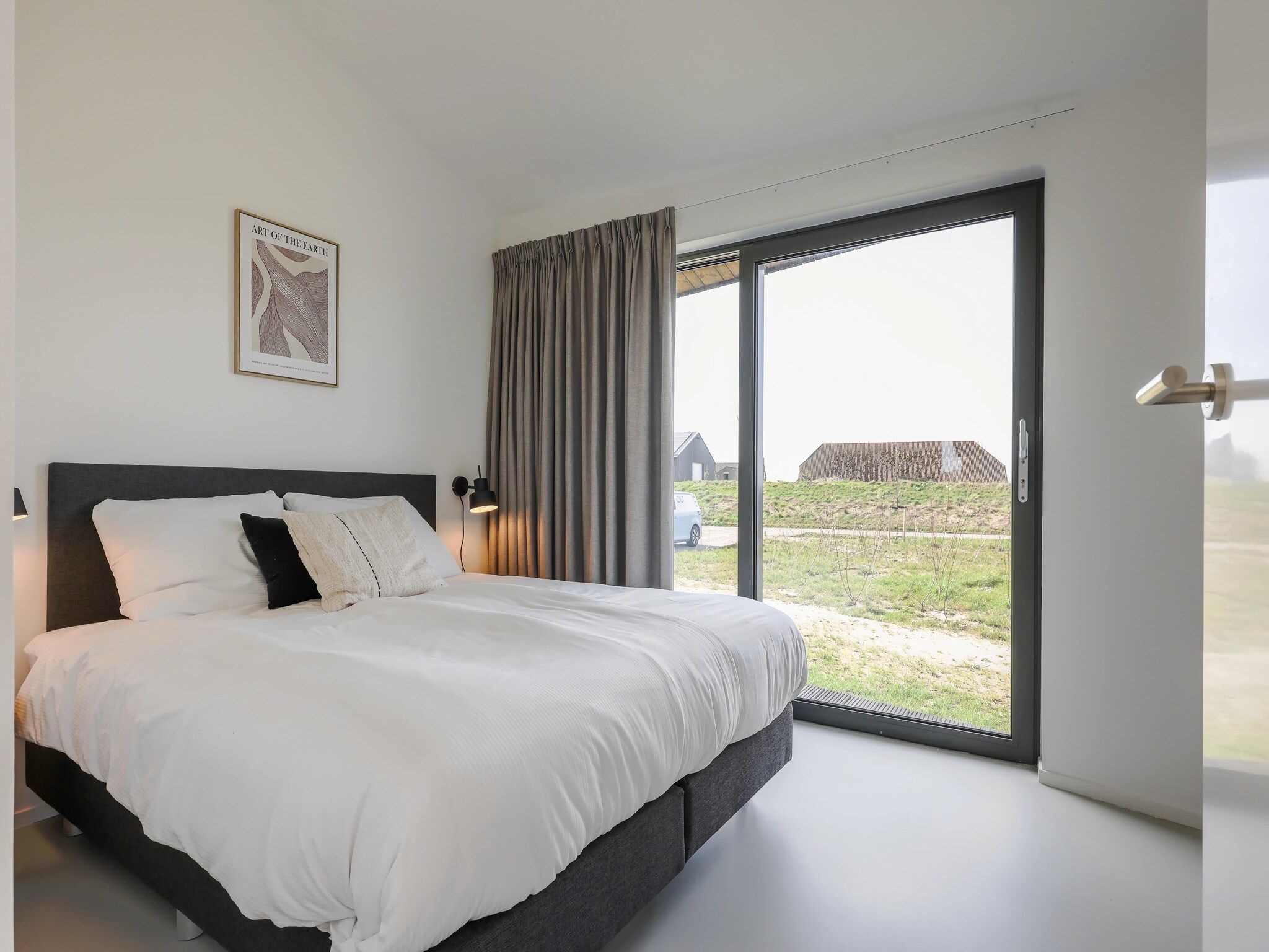 Een slaapkamer van Heerlijkheid Vlietenburg 12 in Wissenkerke