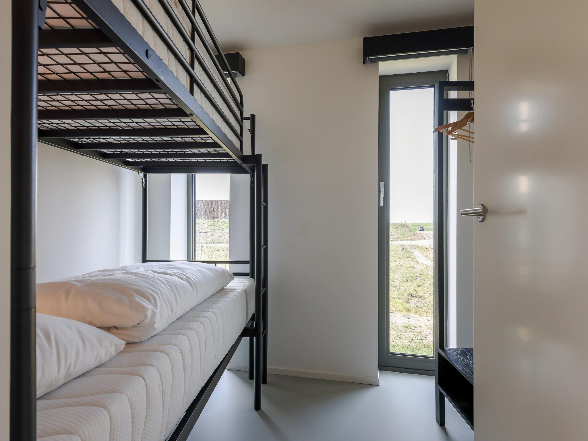 Een slaapkamer van Heerlijkheid Vlietenburg 12 in Wissenkerke