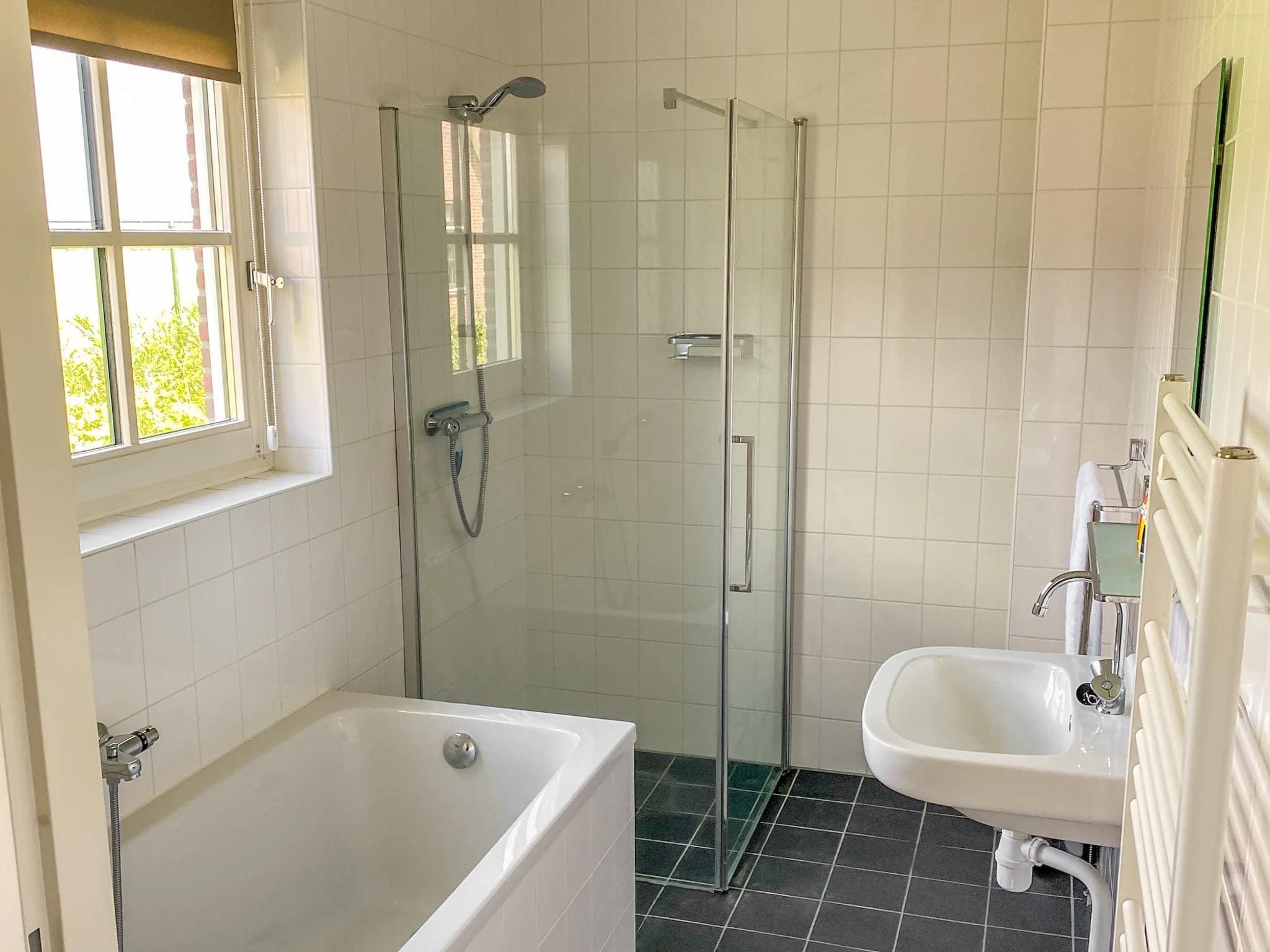 De badkamer van Villaparc Schoonhovenseland 2 in Hollandscheveld