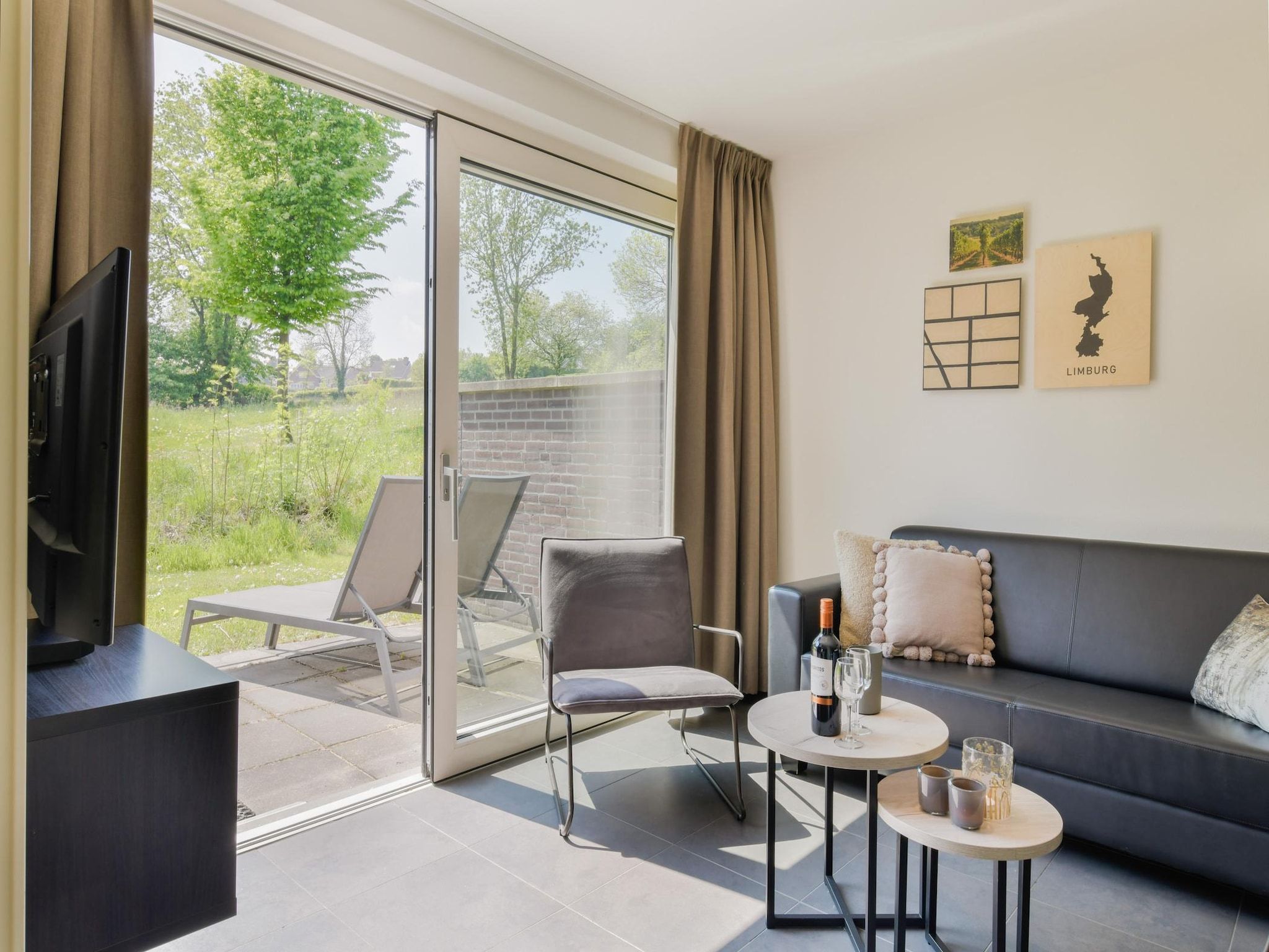De woonkamer van Vakantiepark Reevallis 5 in Vijlen