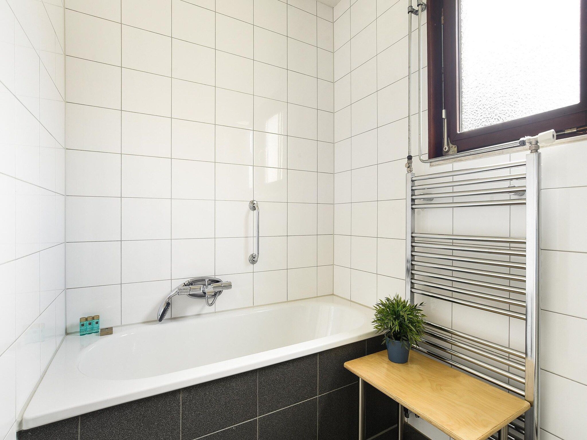De badkamer van Vakantiepark Reevallis 6 in Vijlen