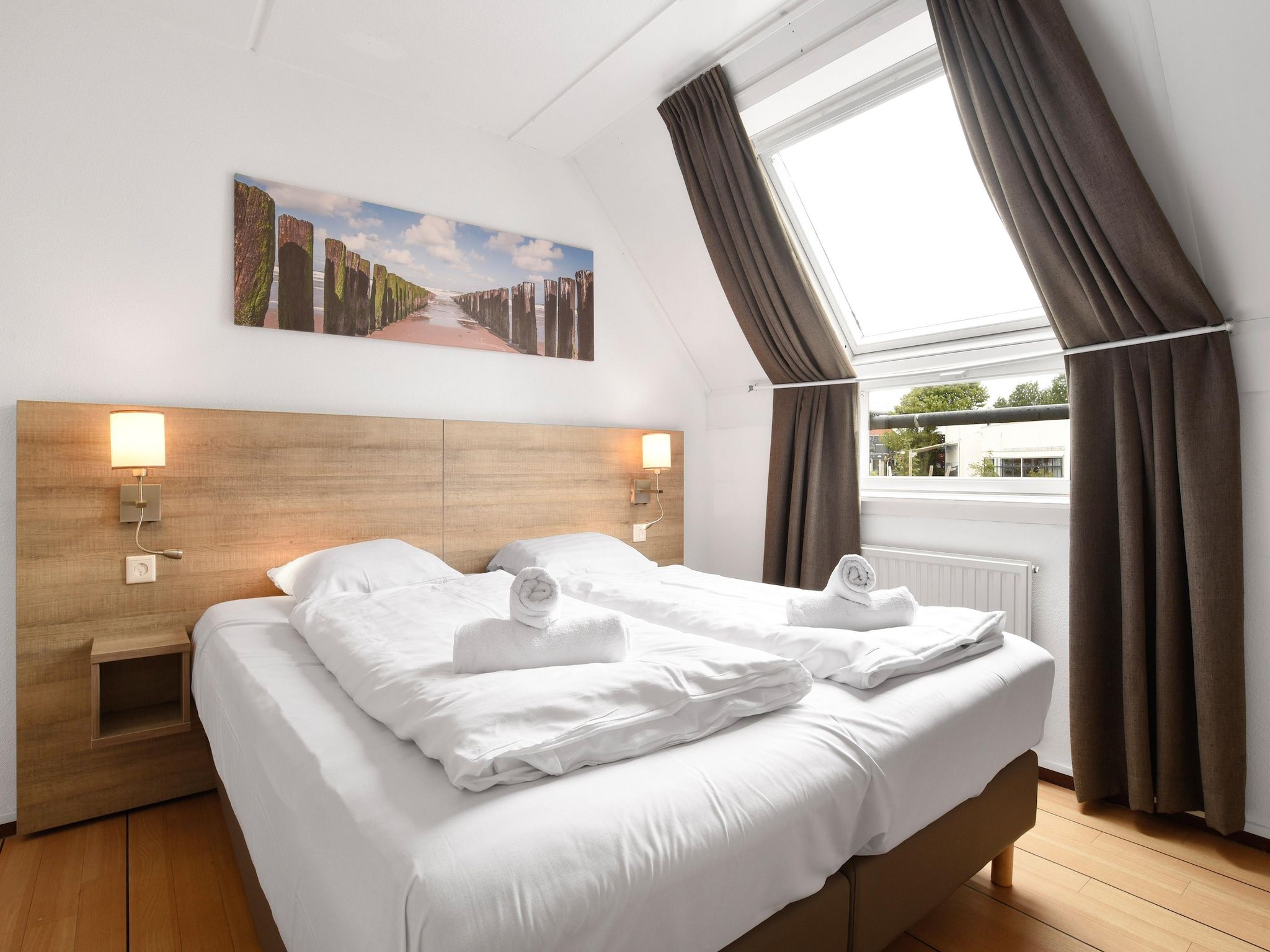 Een slaapkamer van Parc Port Greve 3 in Brouwershaven