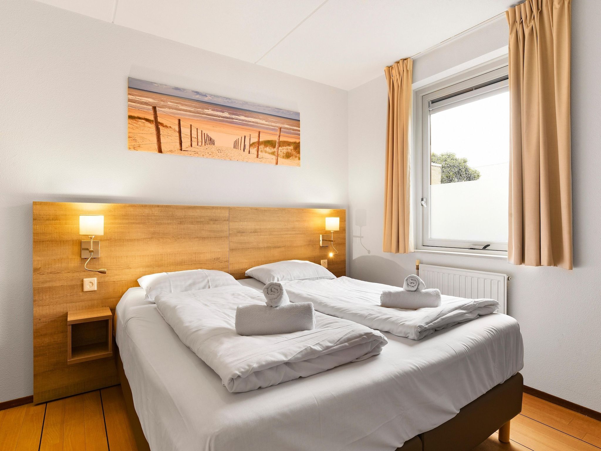 Een slaapkamer van Parc Port Greve 5 in Brouwershaven