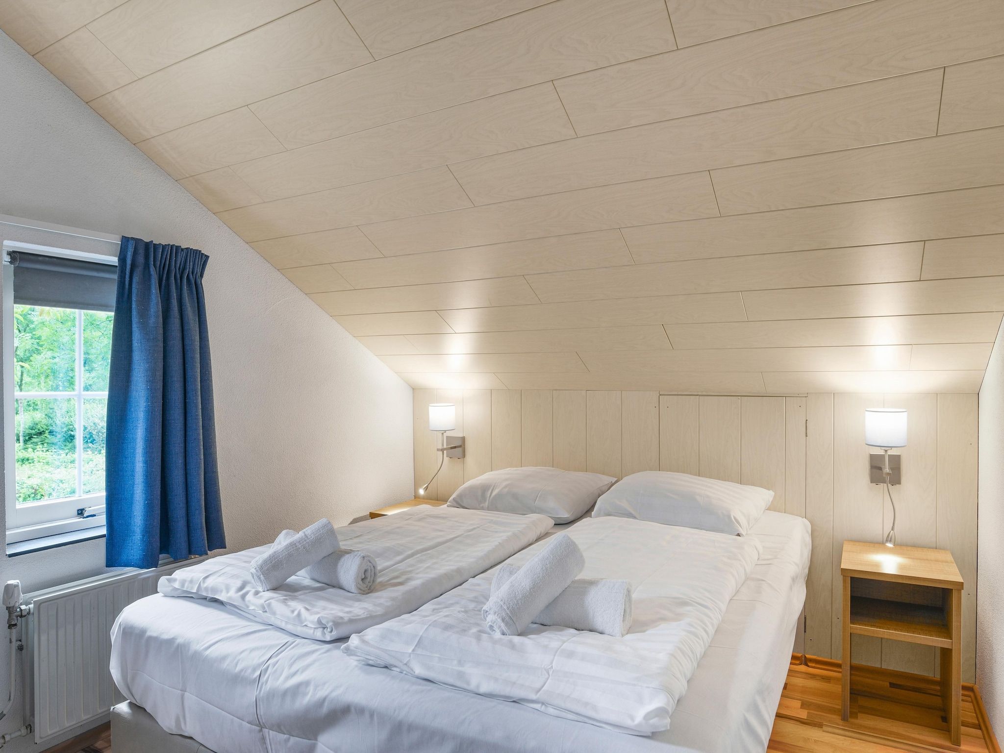 Een slaapkamer van Parc Port Greve 8 in Brouwershaven