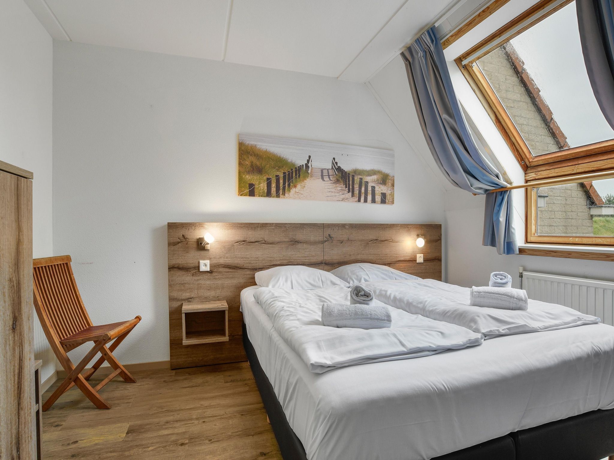 Een slaapkamer van Parc Port Greve 15 in Brouwershaven