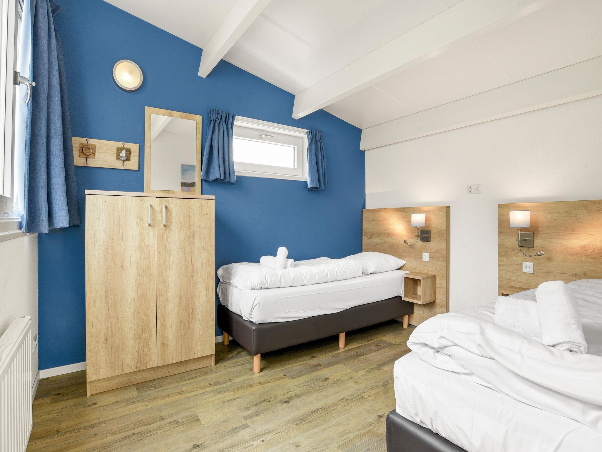 Een slaapkamer van Parc Port Greve 19 in Brouwershaven