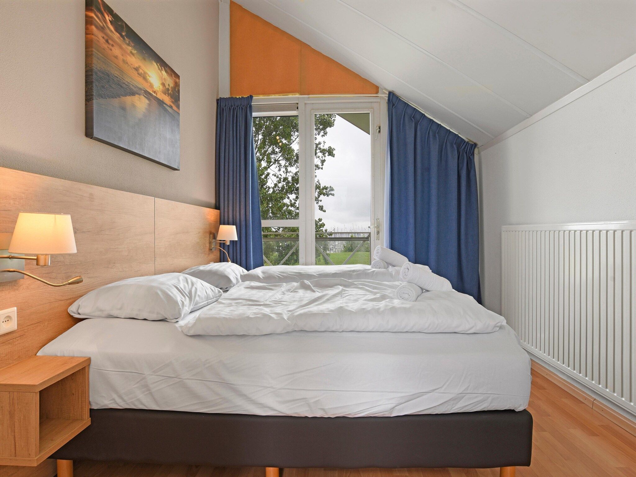 Een slaapkamer van Parc Port Greve 20 in Brouwershaven