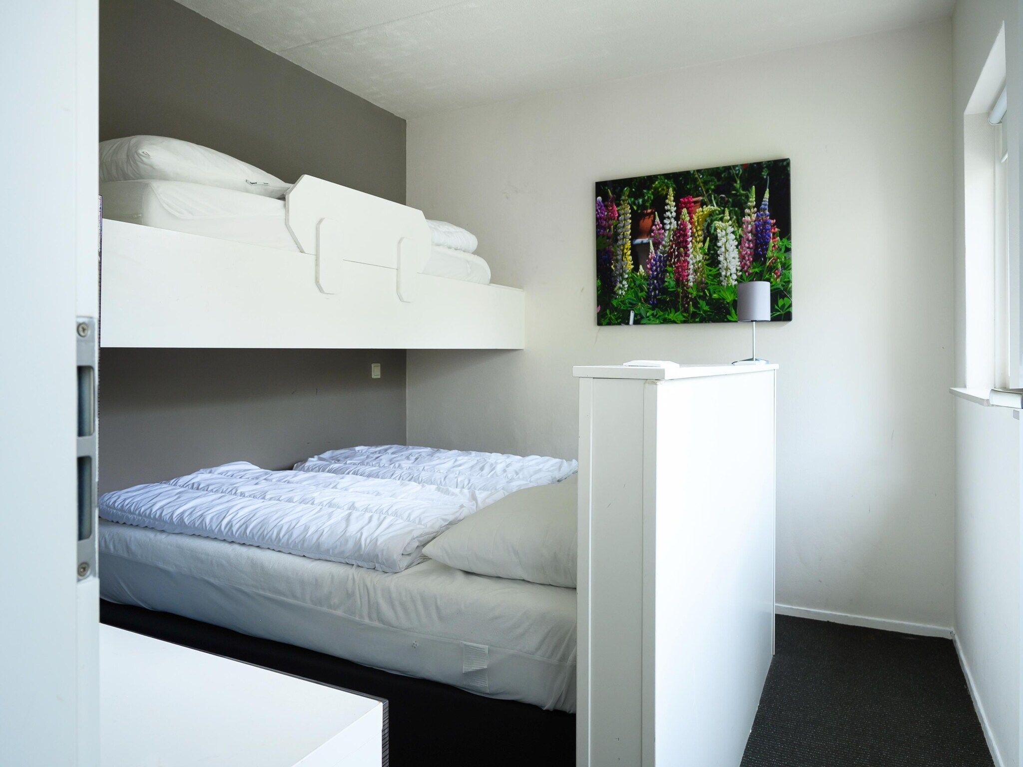 Een slaapkamer van 18 pers Ellersinghuis wellness met houtgestookte hottub in Vlagtwedde