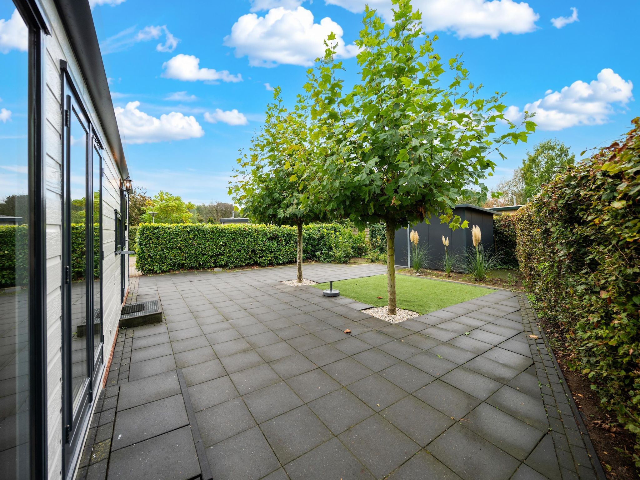 De tuin van Chalet 56 stegeren in Stegeren
