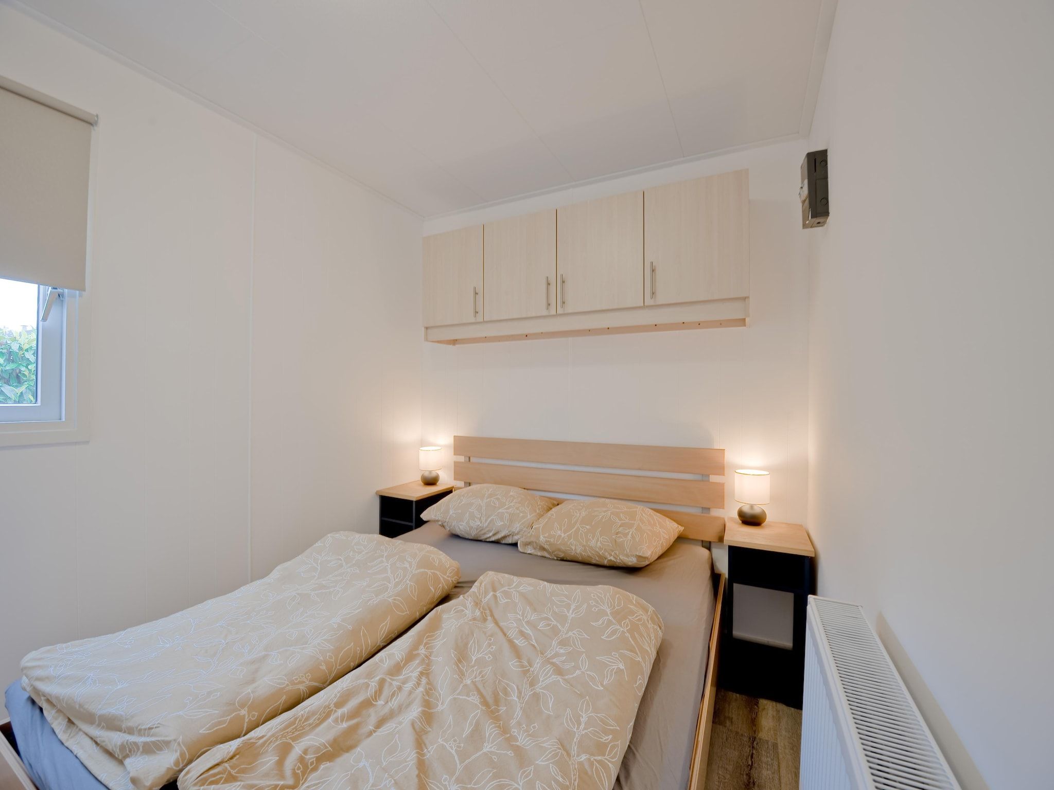 Een slaapkamer van Chalet 56 stegeren in Stegeren