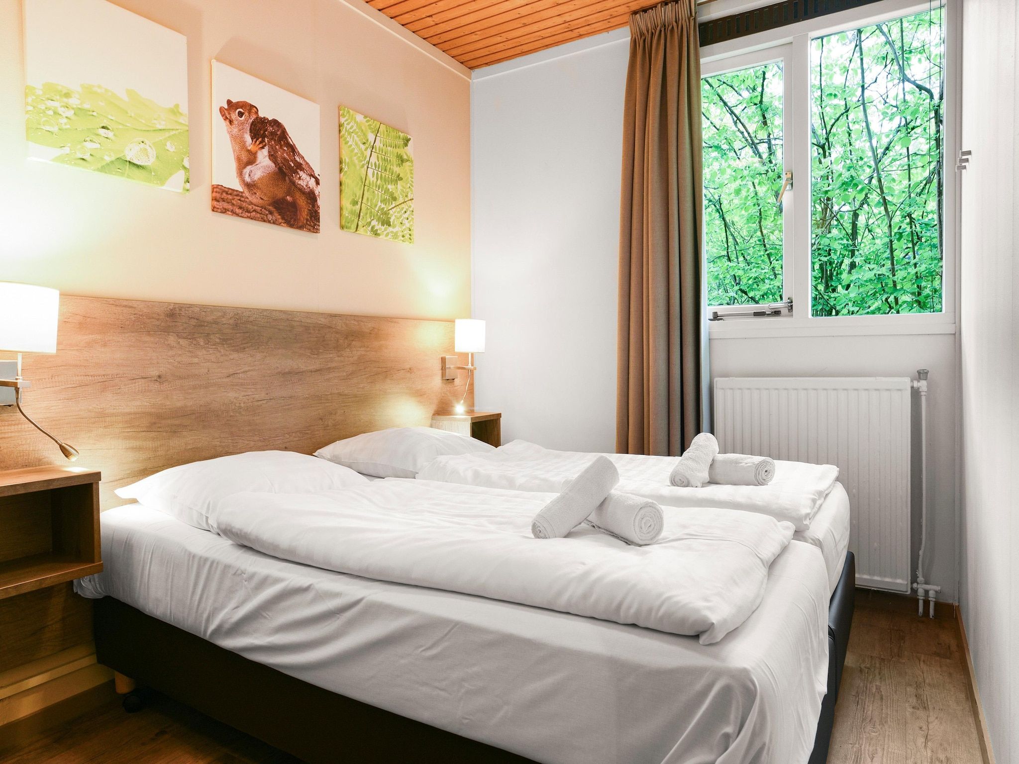 Een slaapkamer van Parc Heihaas 15 in Putten