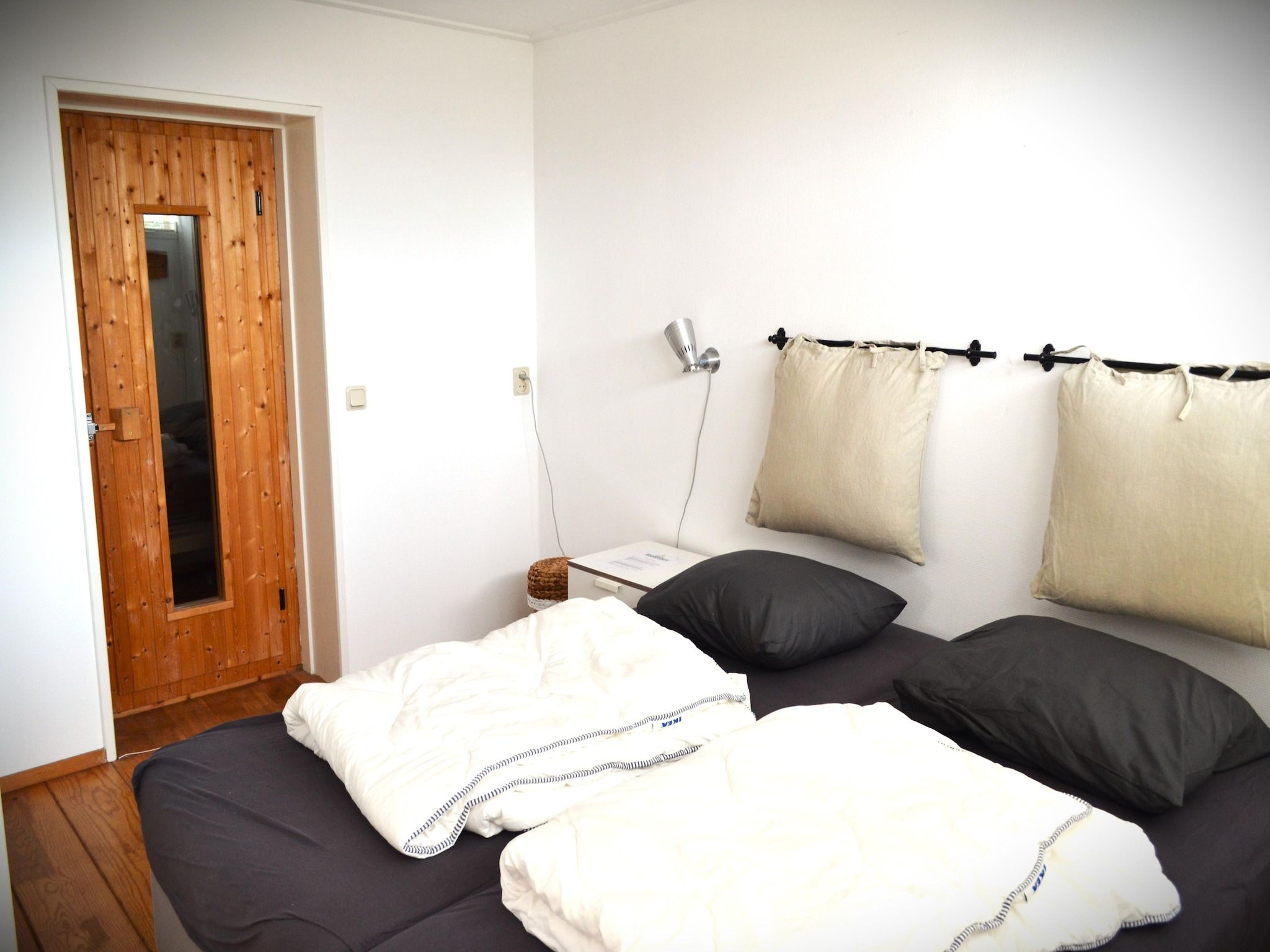 Een slaapkamer van Golfvilla 38 comfort in Hollum