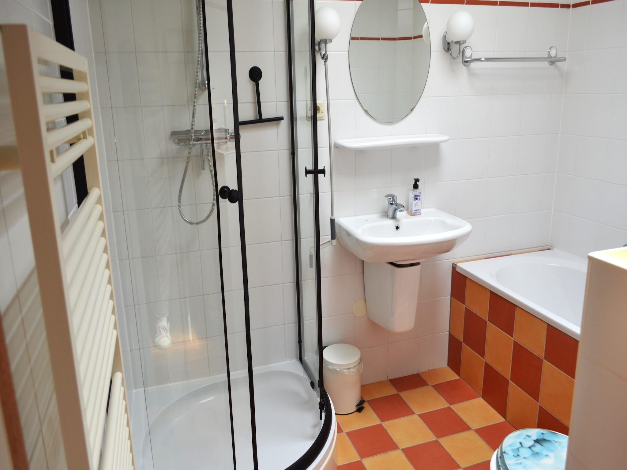 De badkamer van Golfvilla 38 comfort in Hollum