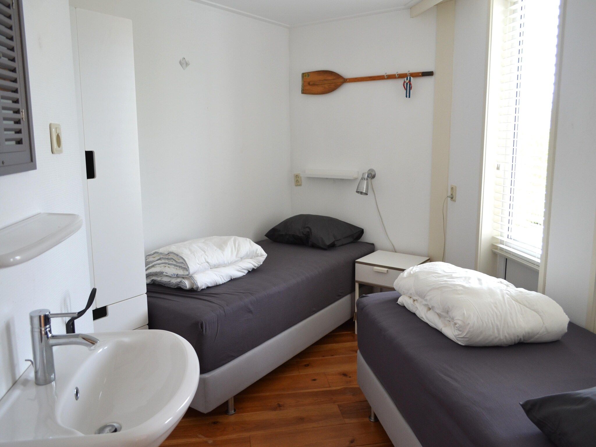 Een slaapkamer van Golfvilla 38 comfort in Hollum