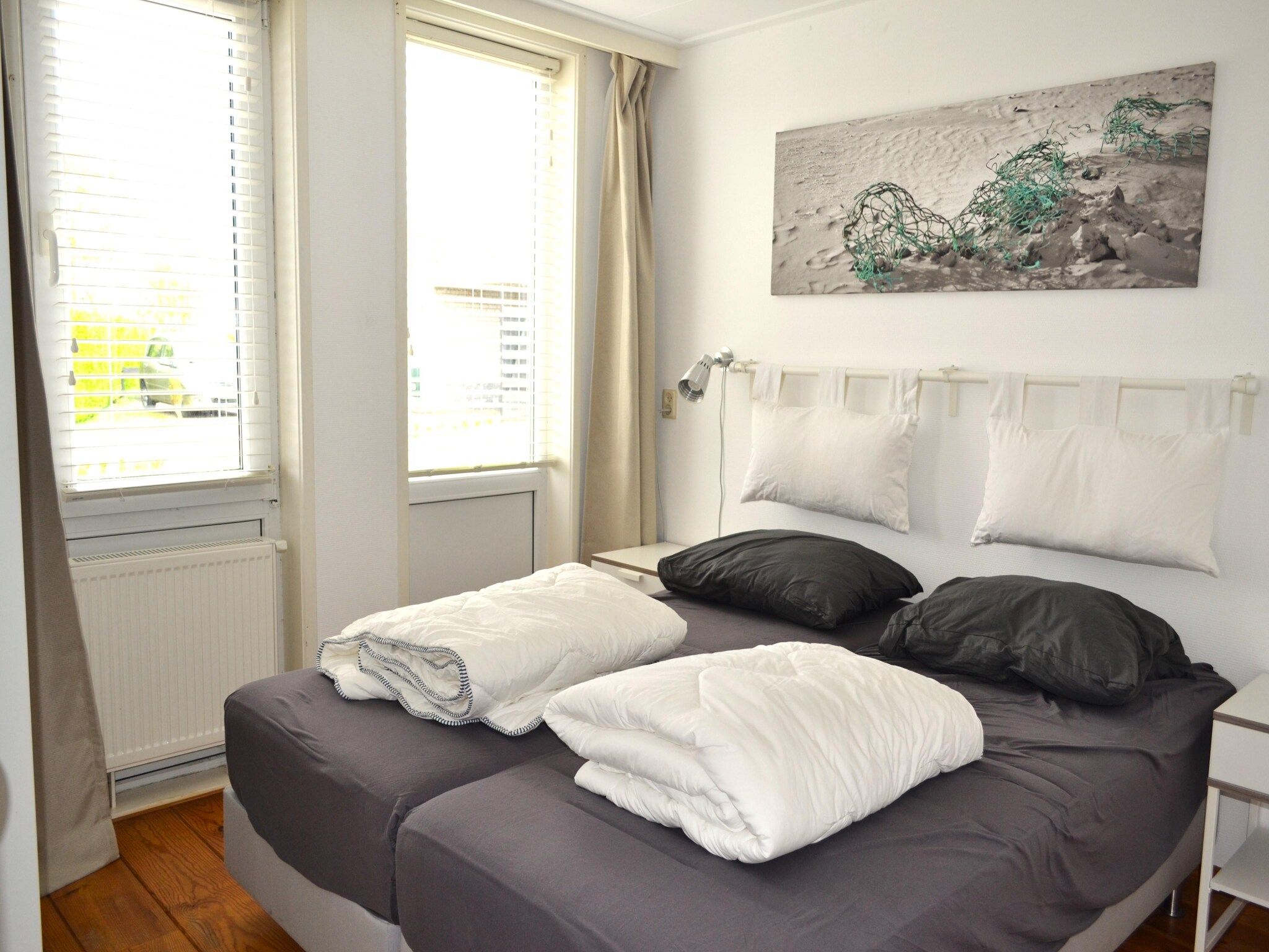 Een slaapkamer van Golfvilla 38 comfort in Hollum