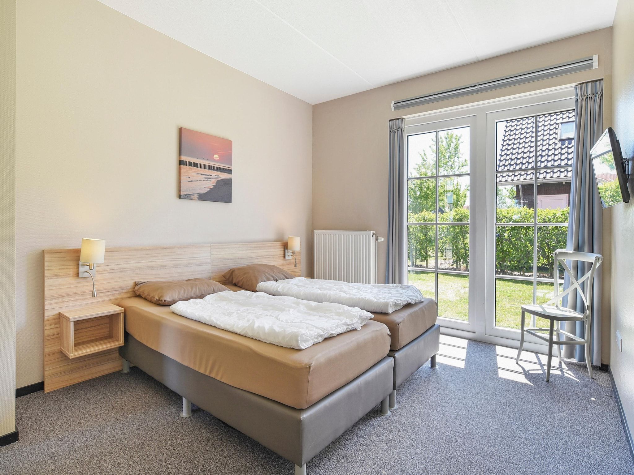 Een slaapkamer van Strand Resort Nieuwvliet-Bad 4 in Nieuwvliet