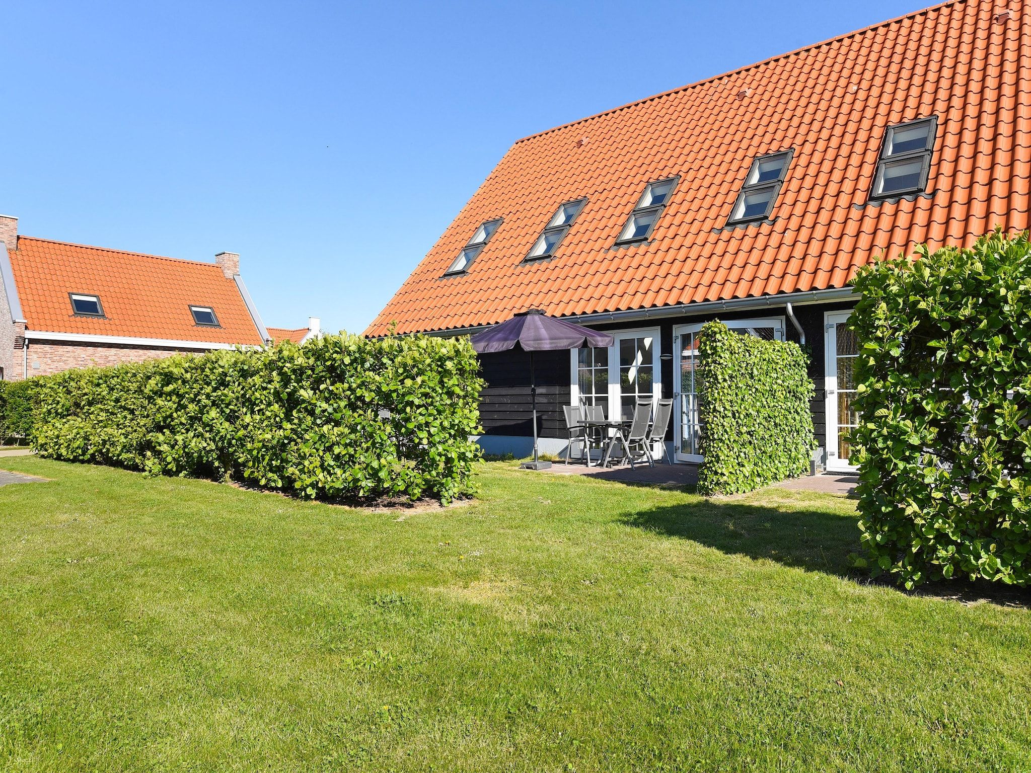 De tuin van Strand Resort Nieuwvliet-Bad 6 in Nieuwvliet