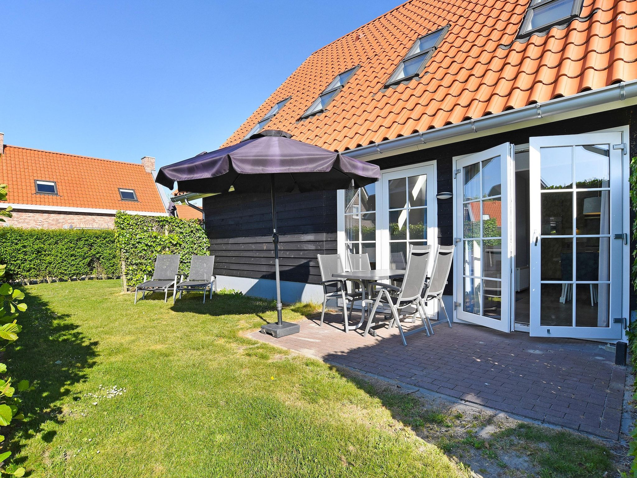 Het terras van Strand Resort Nieuwvliet-Bad 6 in Nieuwvliet