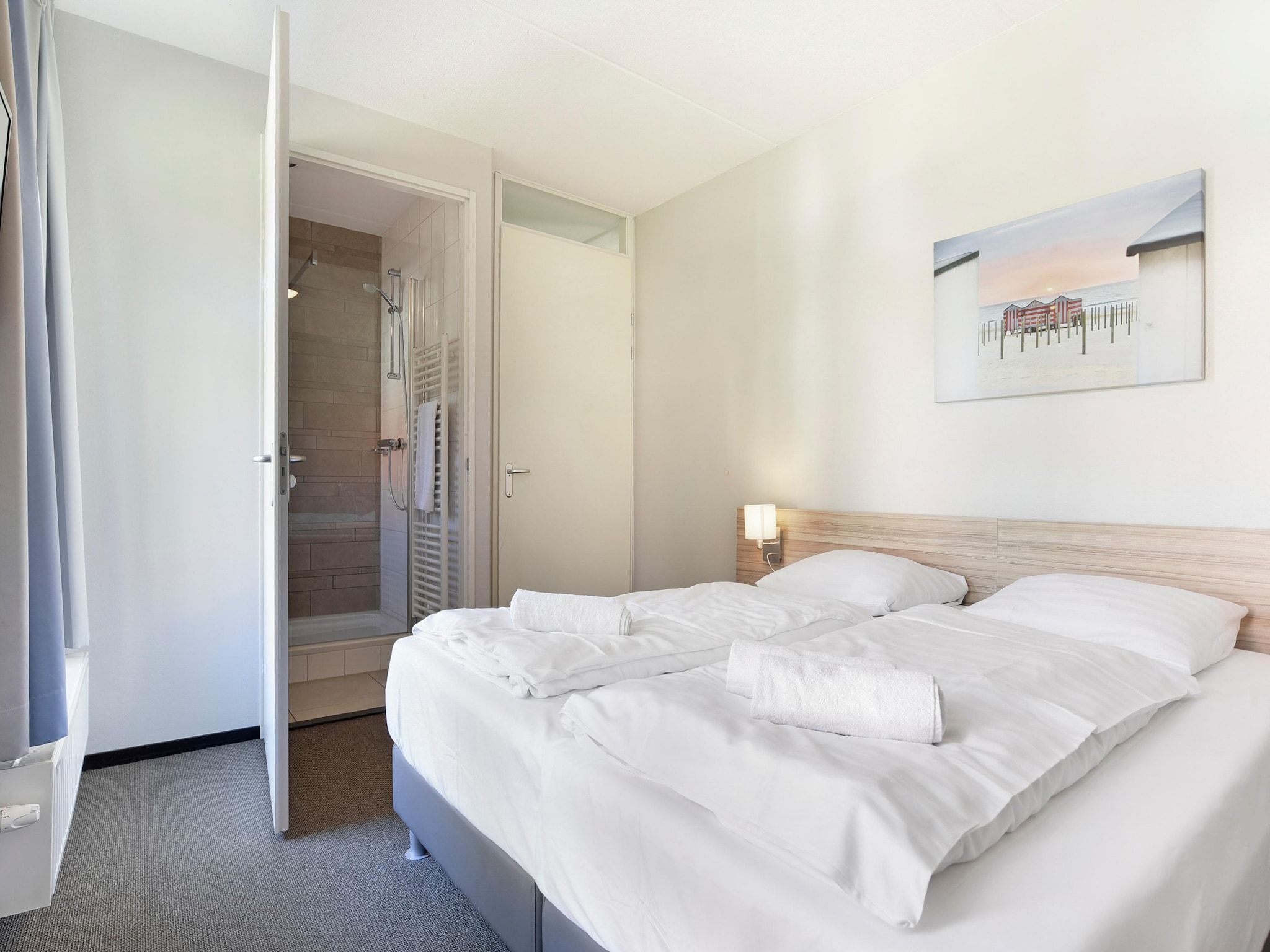 Een slaapkamer van Strand Resort Nieuwvliet-Bad 13 in Nieuwvliet